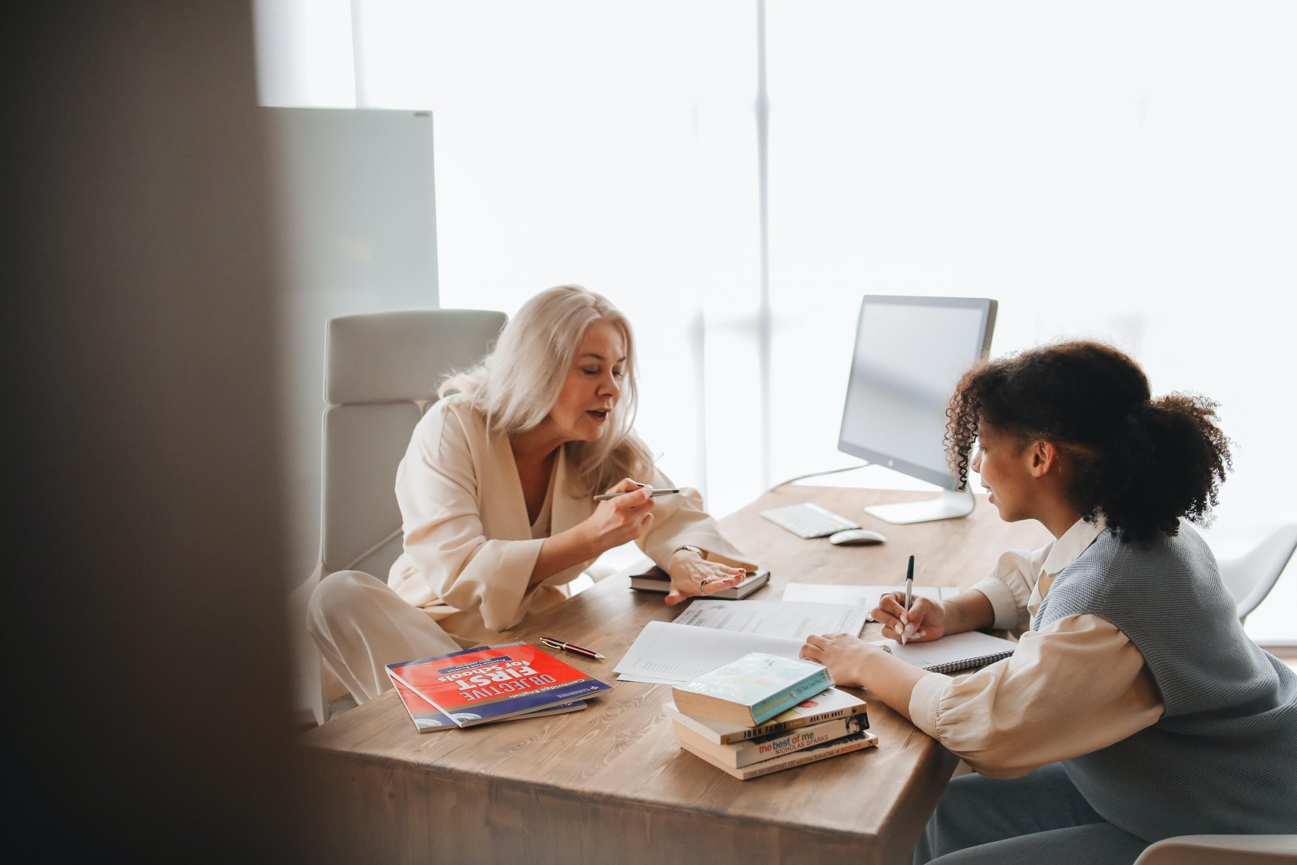 tutor working with student