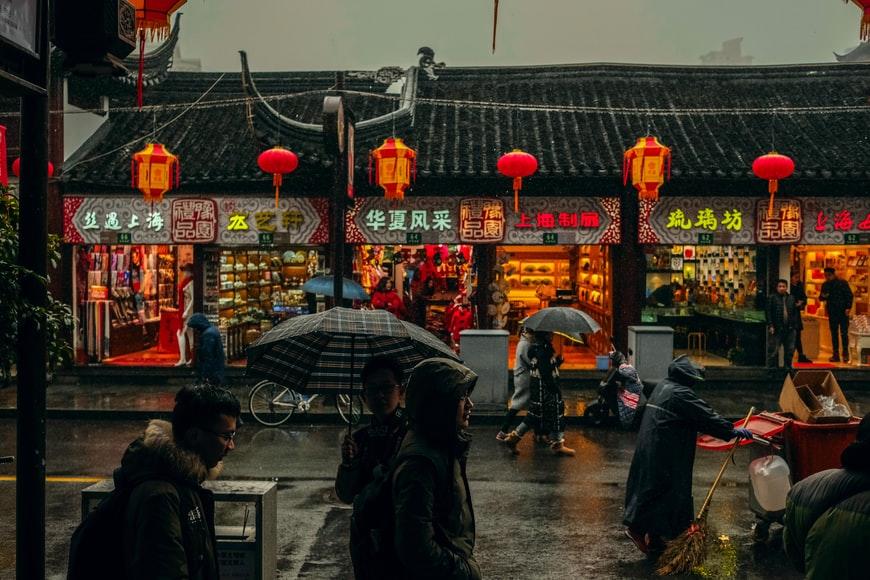 People walking on the road of Shanghai market