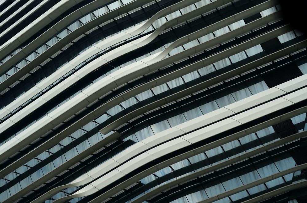 A dark and gray textured structure of a building