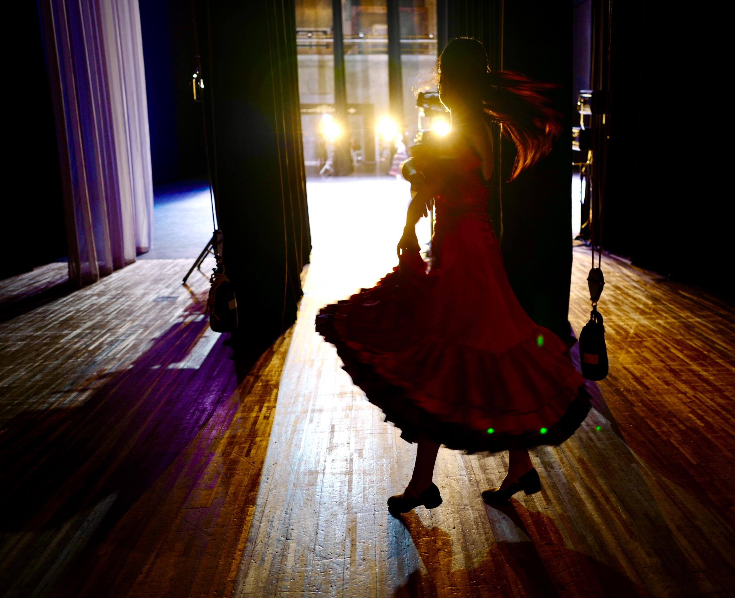 a woman dancing Flamenco