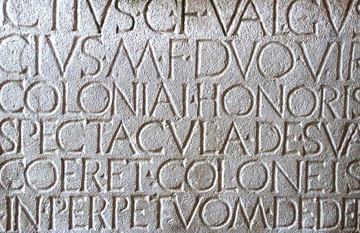 Latin verses engraved on a wall