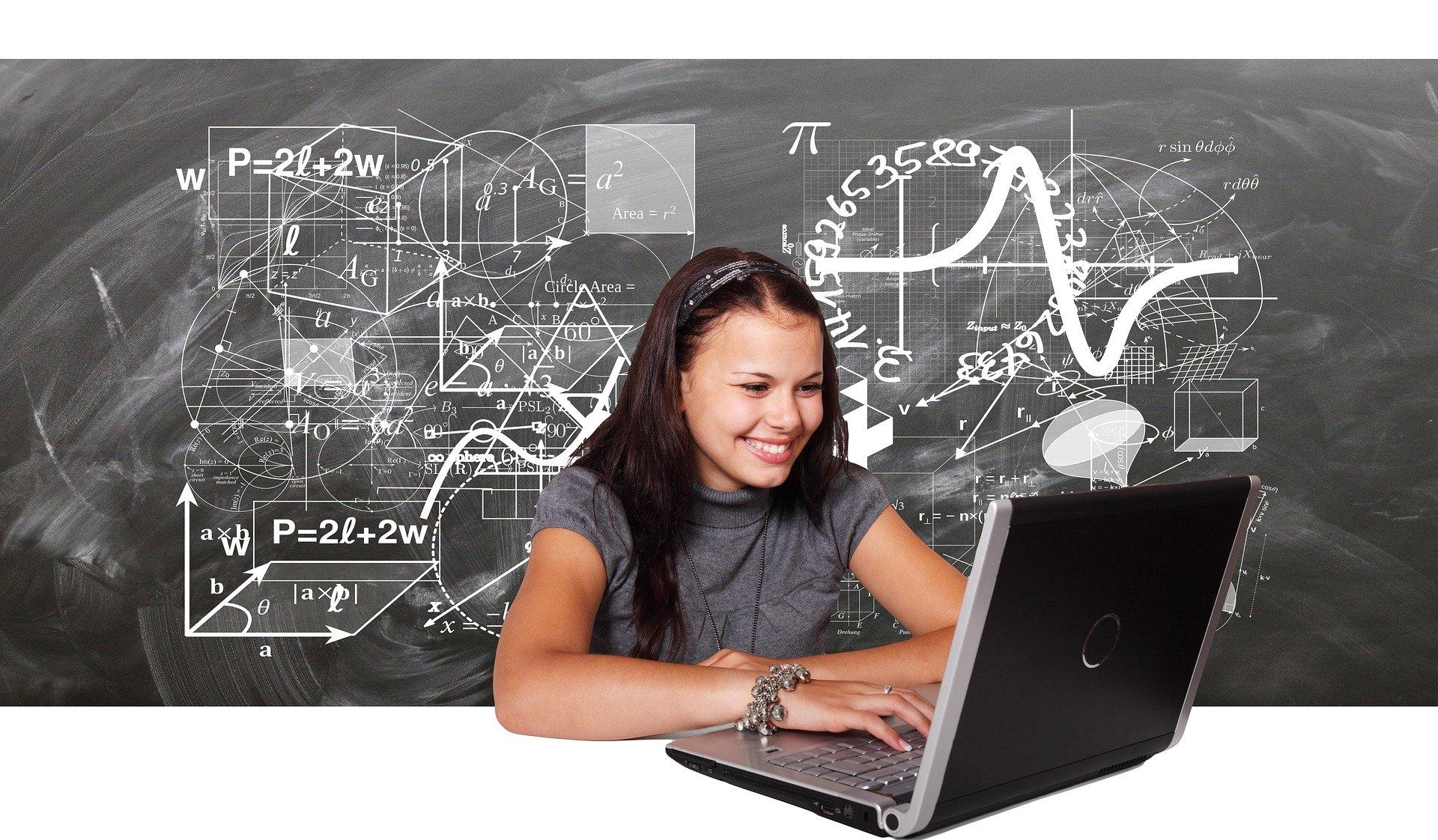 A female student solving geometry problems online using her laptop