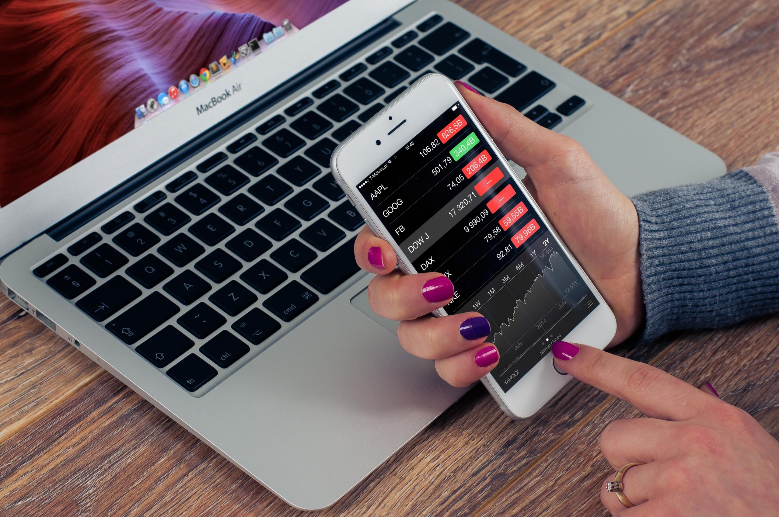 A female accountant checking stock market prices