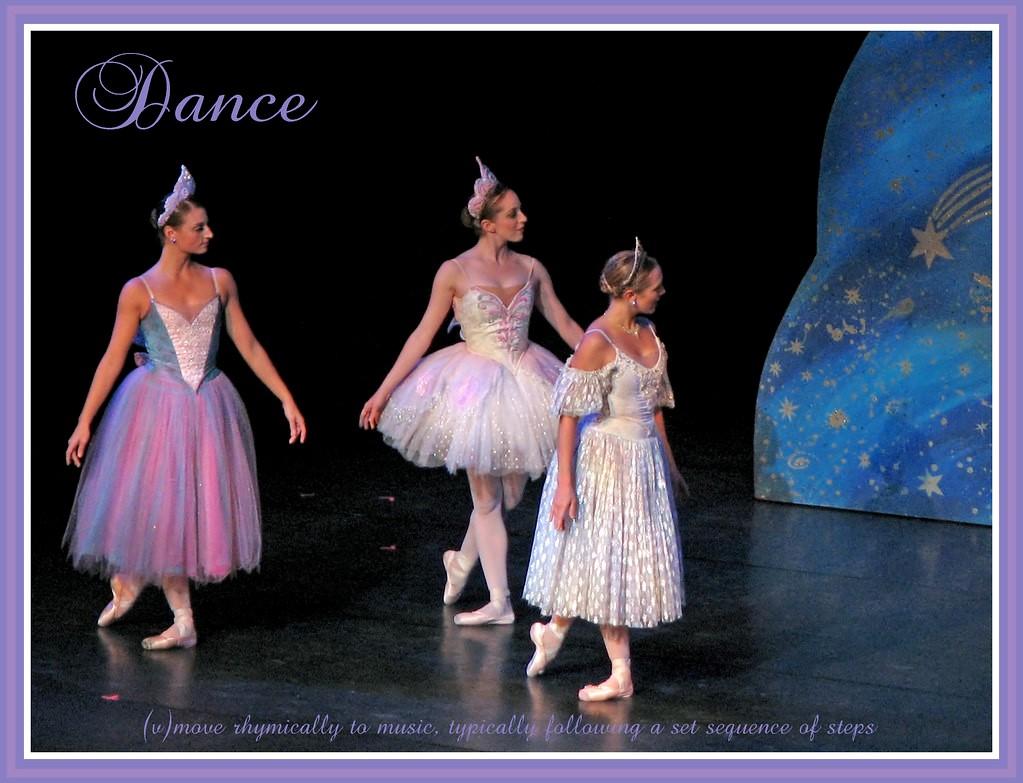 A ballet performance with the definition of dance written