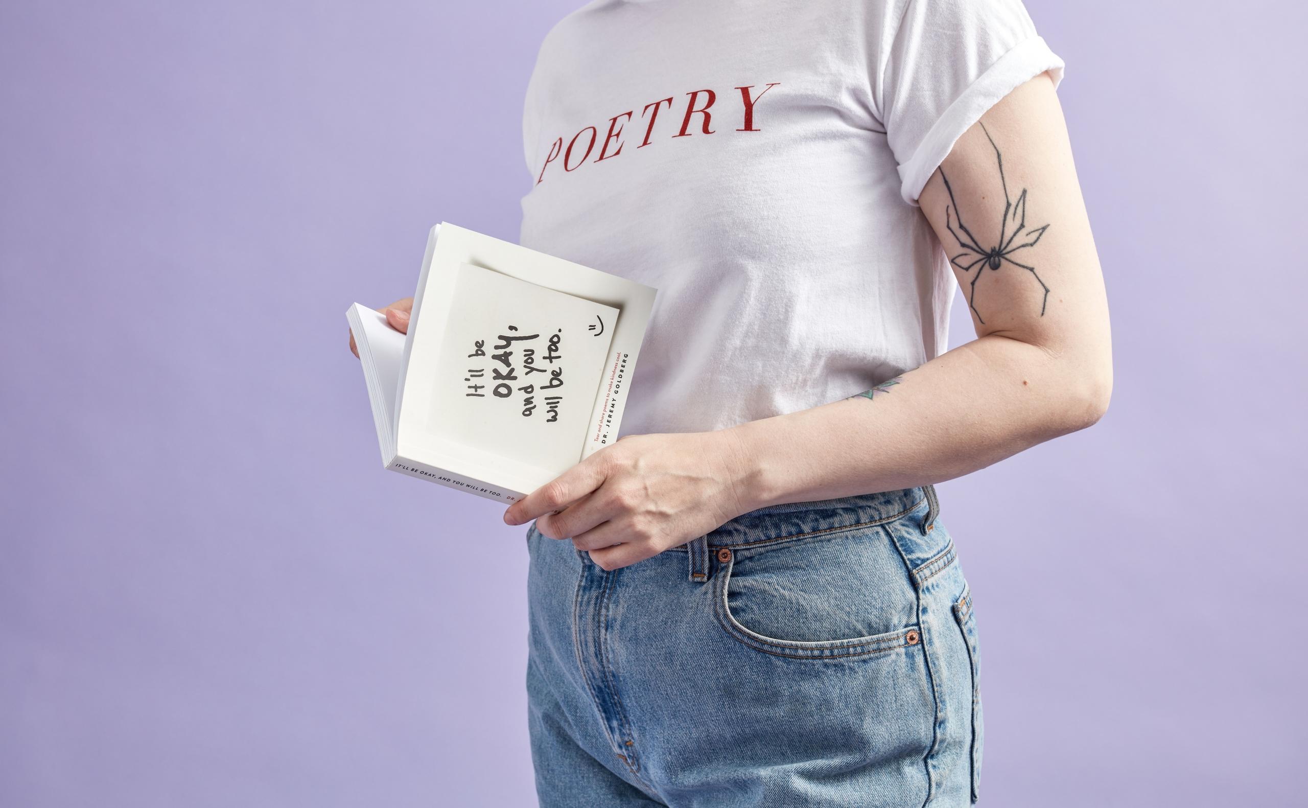 a person with a poetry shirt
