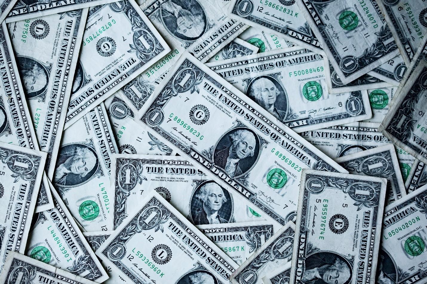 Scattered 1 dollar banknotes
