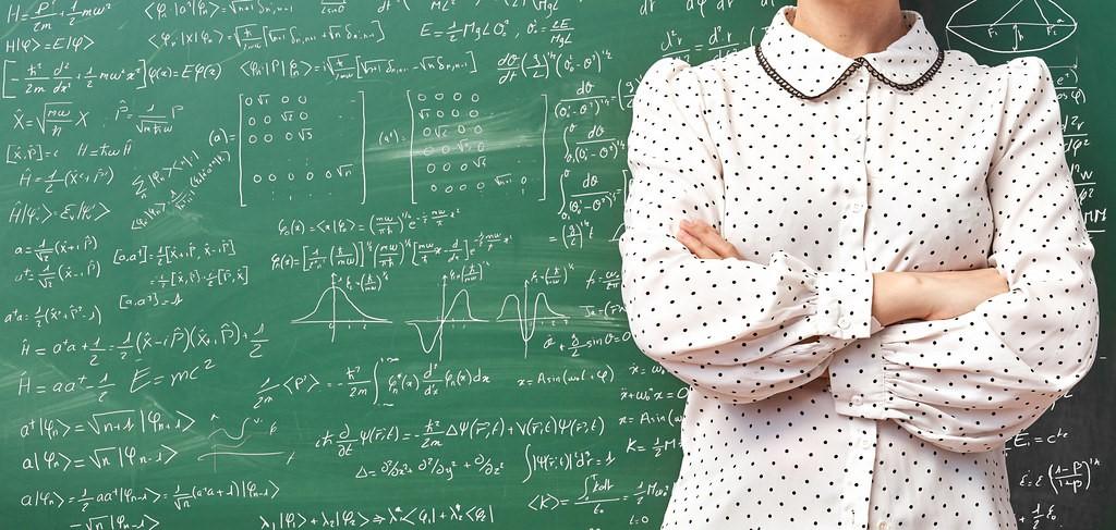 A professor teaching the class physics