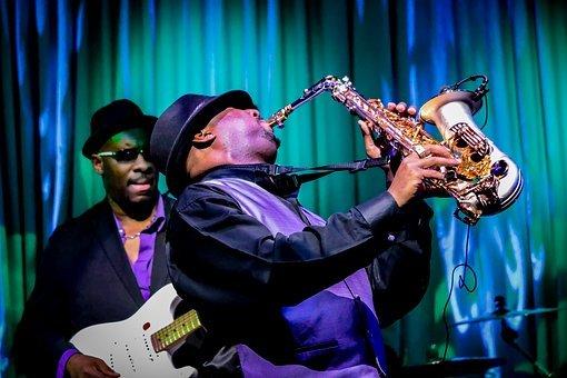 A man playing the saxophone