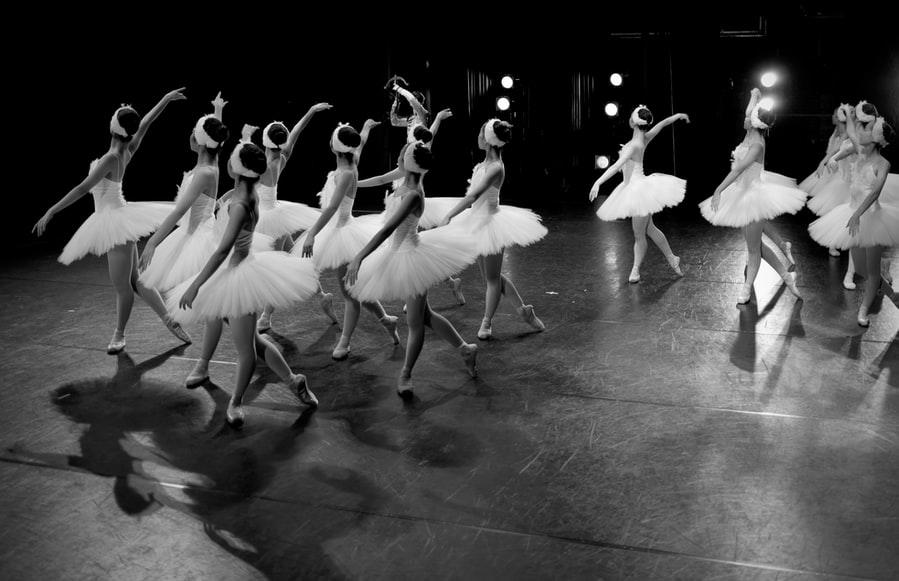 A group of Ballet dancers performing on stage.