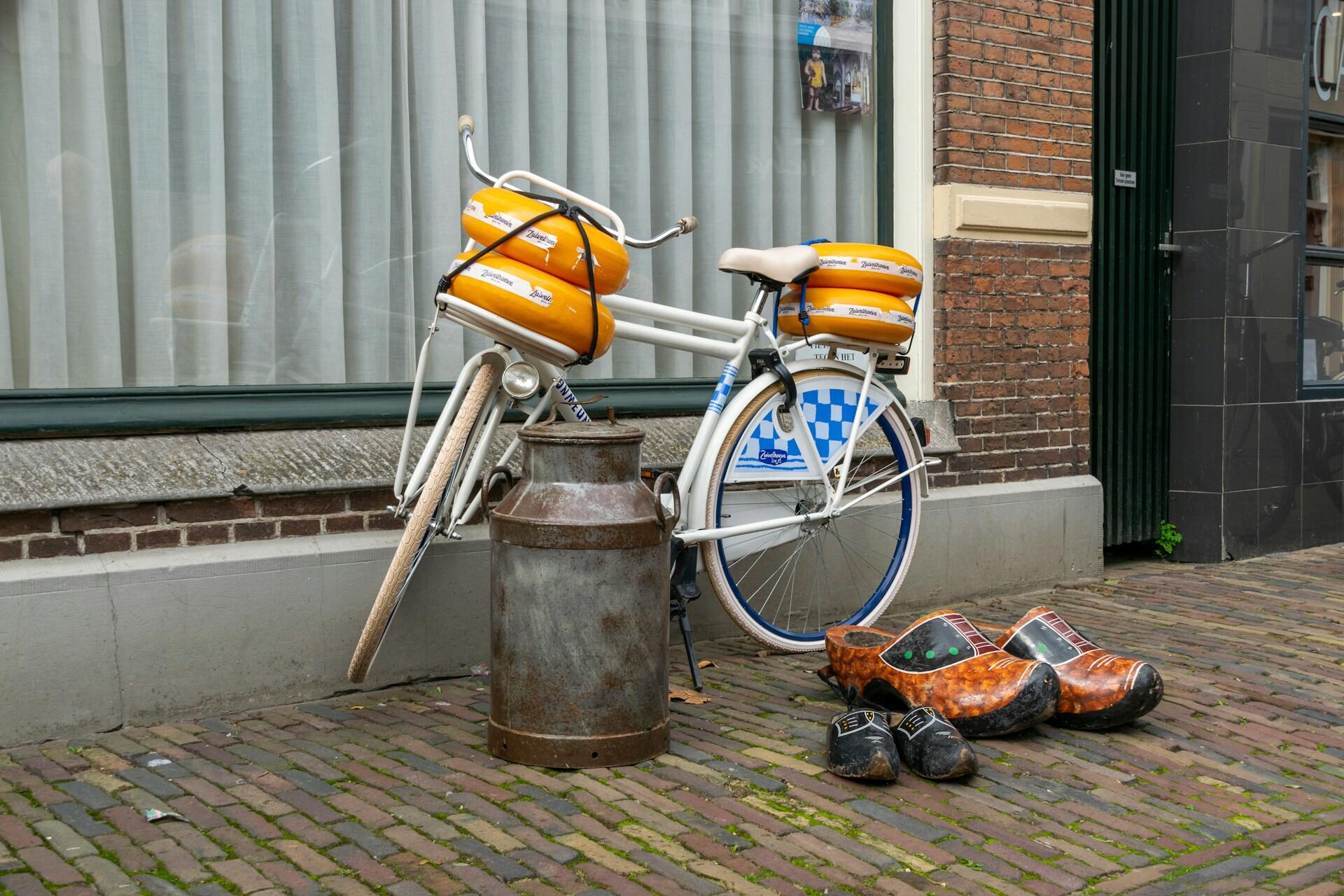 Dutch clogs and a bike with gouda on it.