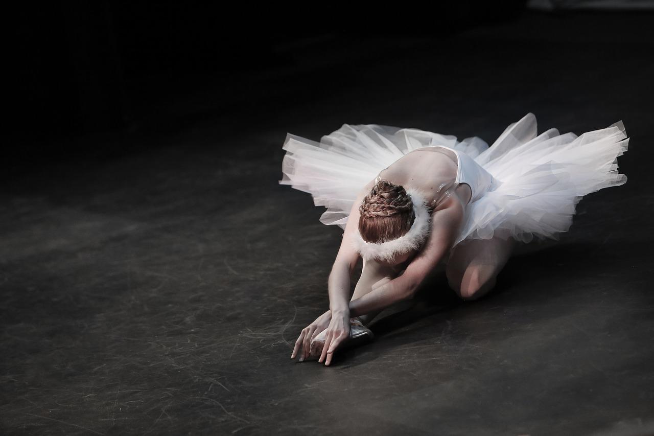 Ballerina stretching out before her performance