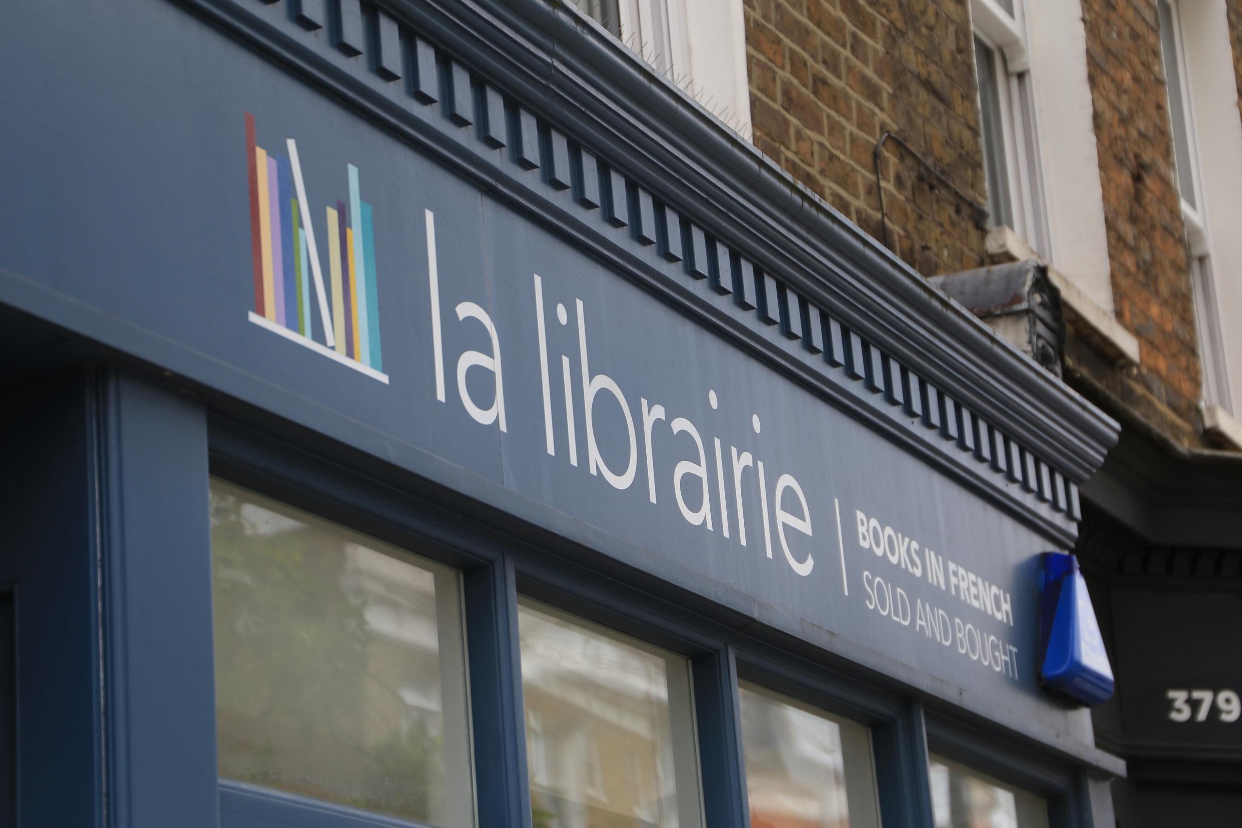 Blue and white windows of a French bookstore