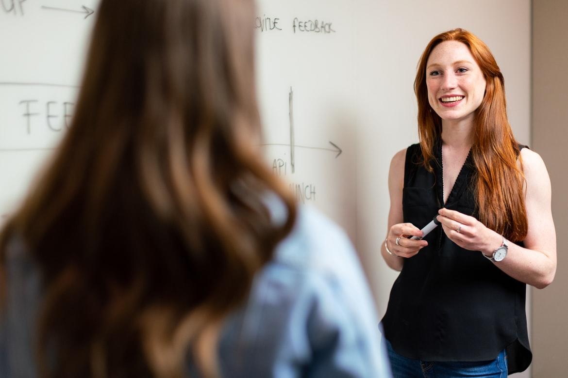 A female tutor in a meeting with a student