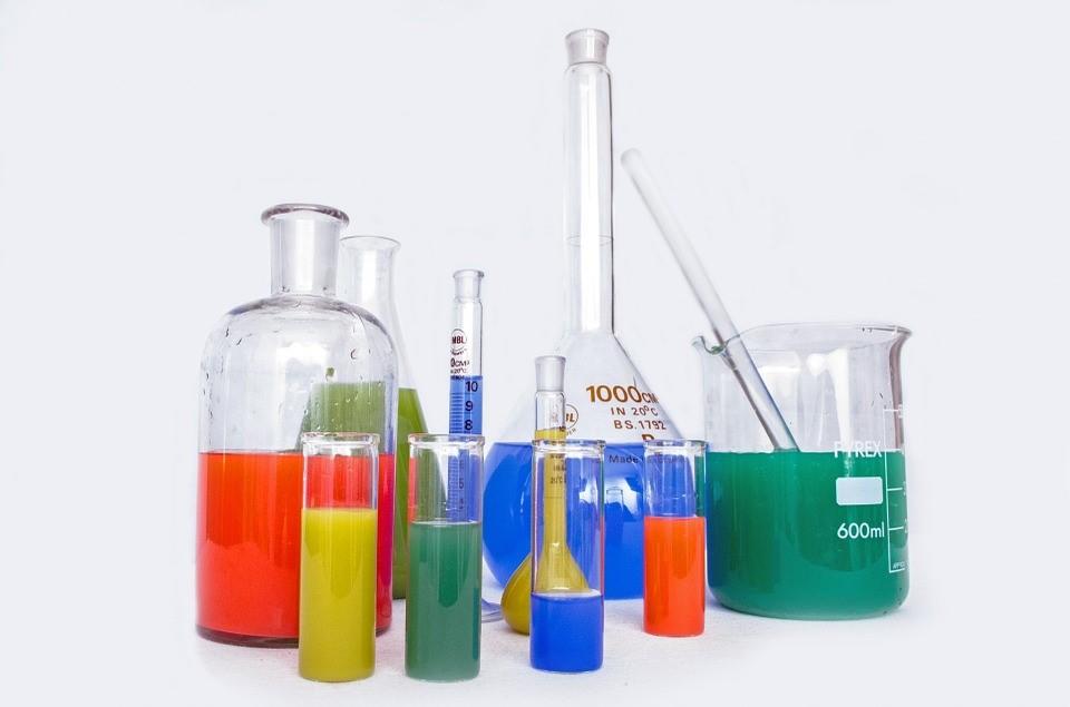 Lab equipment filled with various colorful fluids
