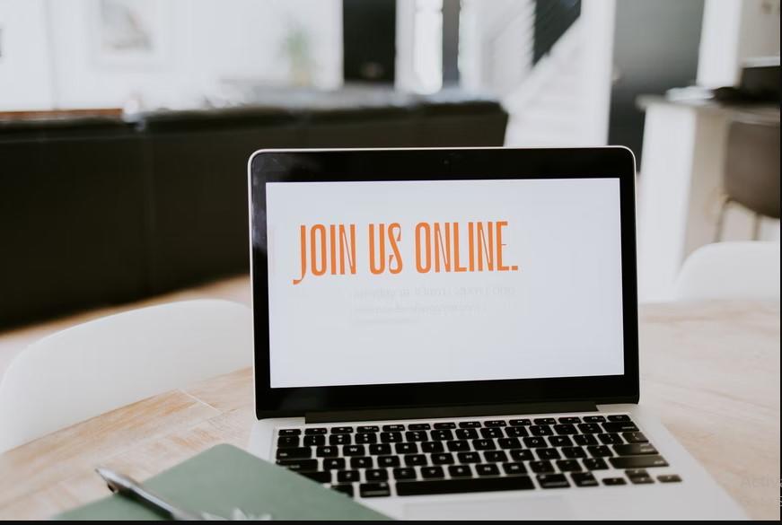 A laptop screen demonstrating an online invitation