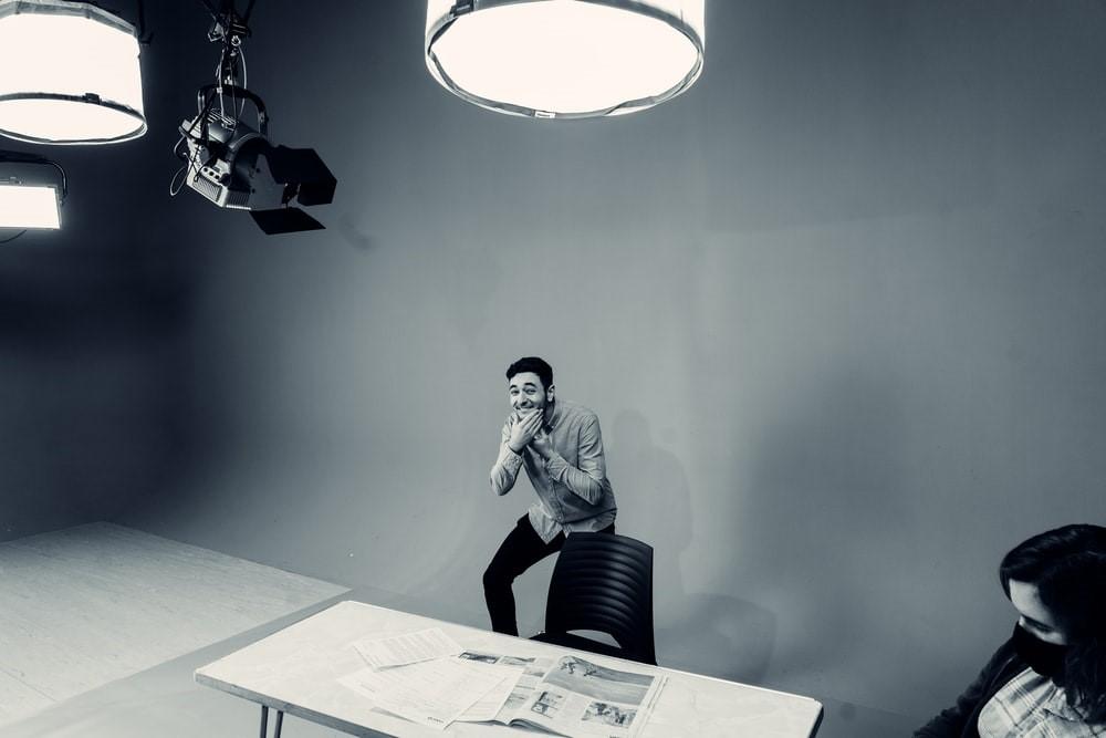 A boy is acting in front of a camera