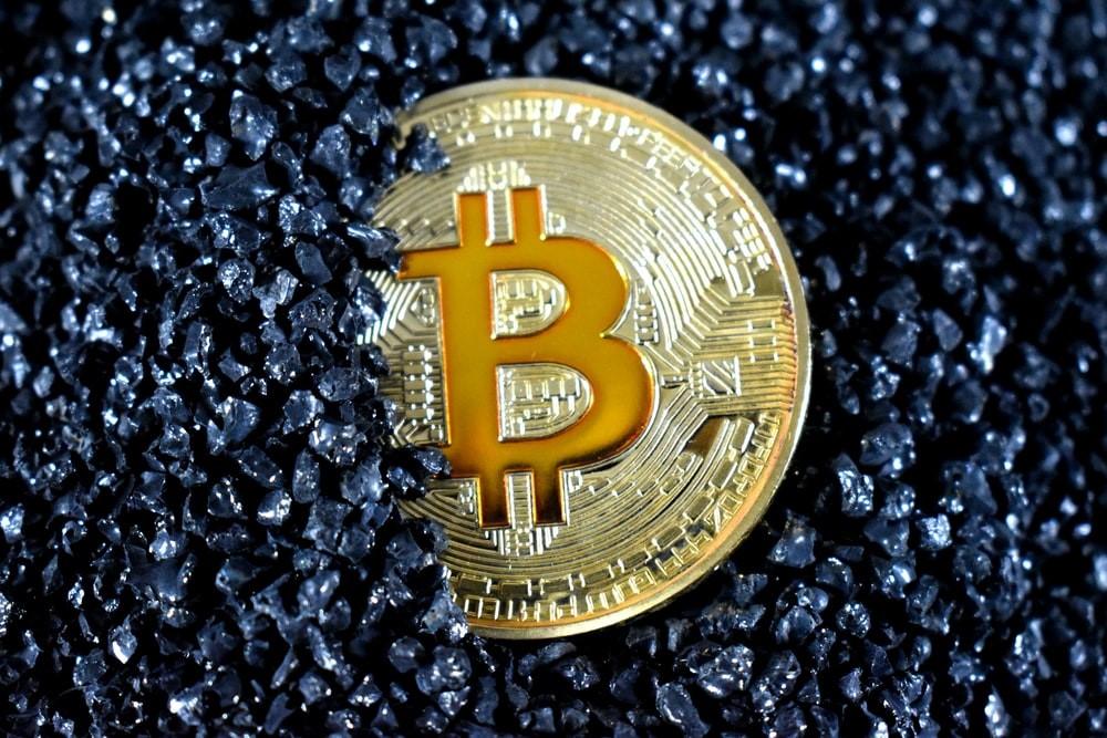 An illustration of gold rounded Bitcoin