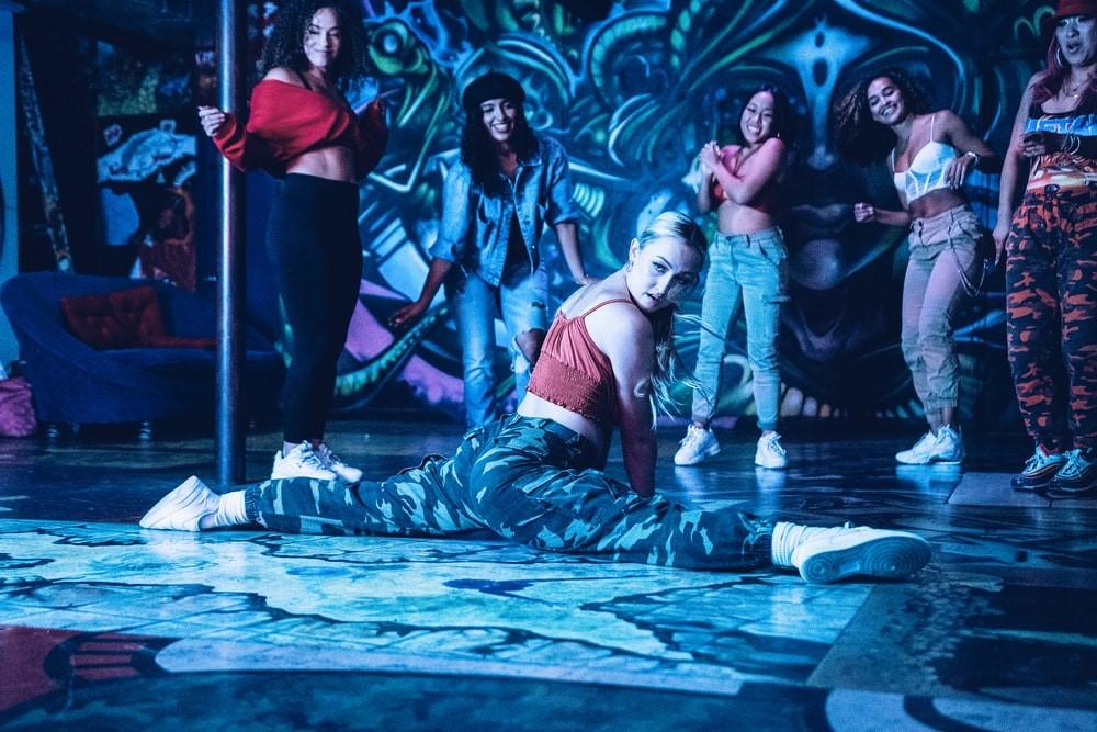 Girls expressing some hip-hop gestures in freestyle posture