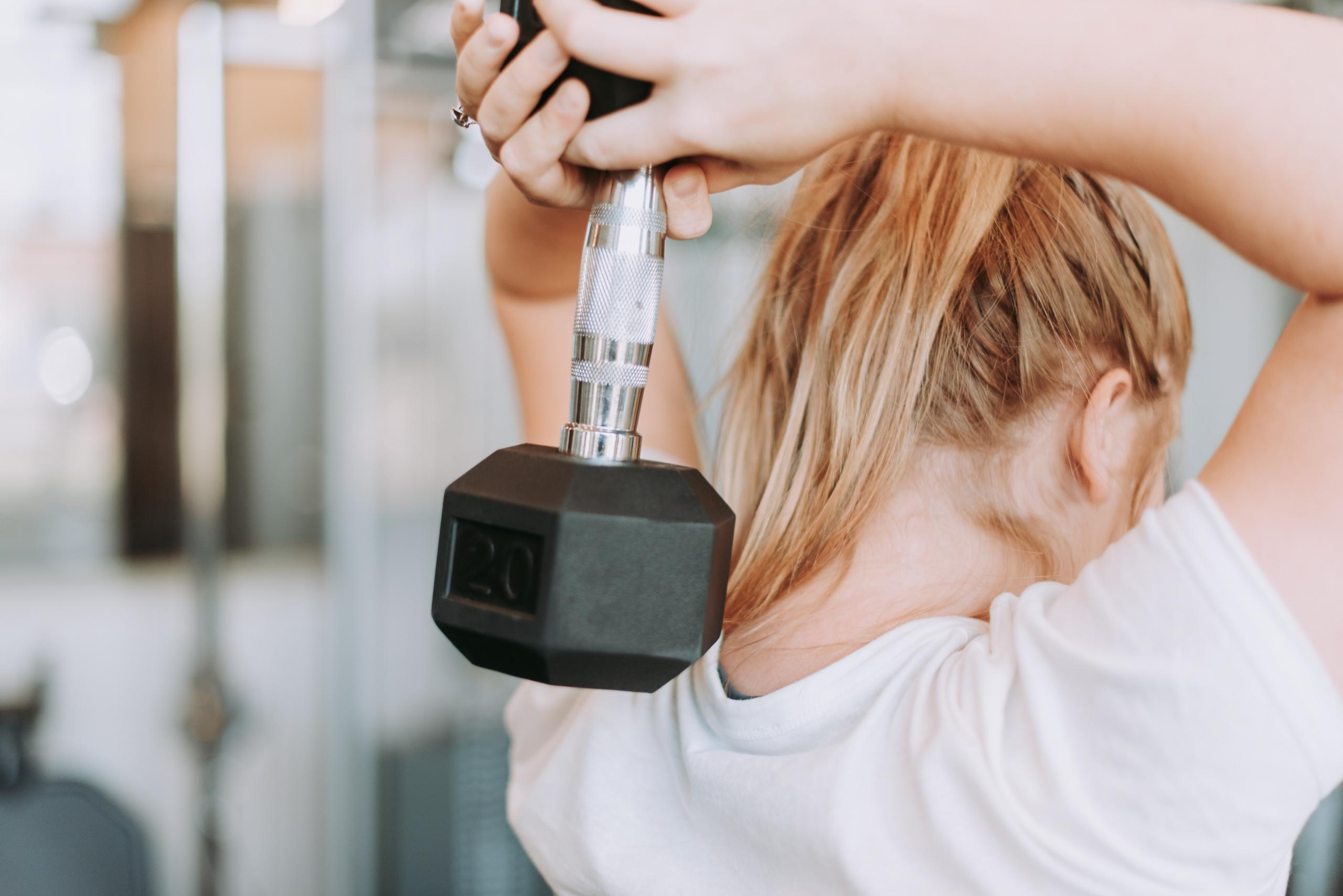 College student lifting weights