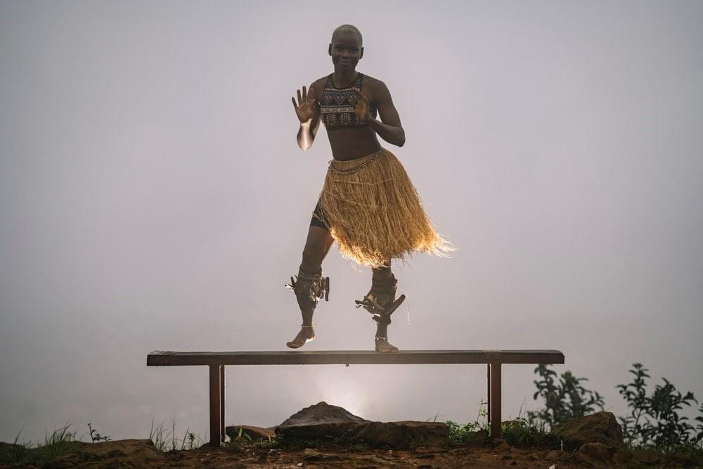 A young African dancer performing an African dance
