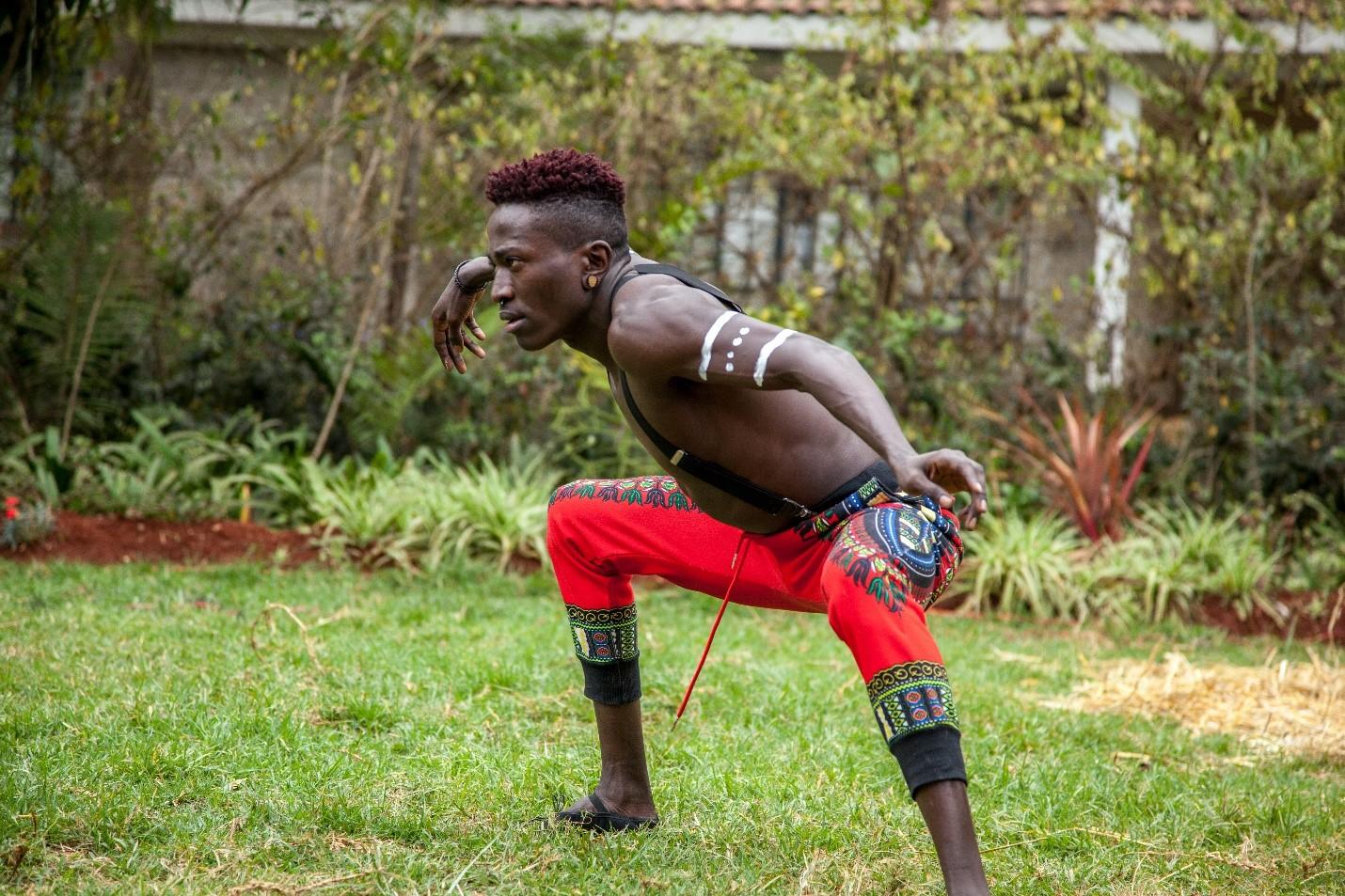 An man performing a traditional African dance