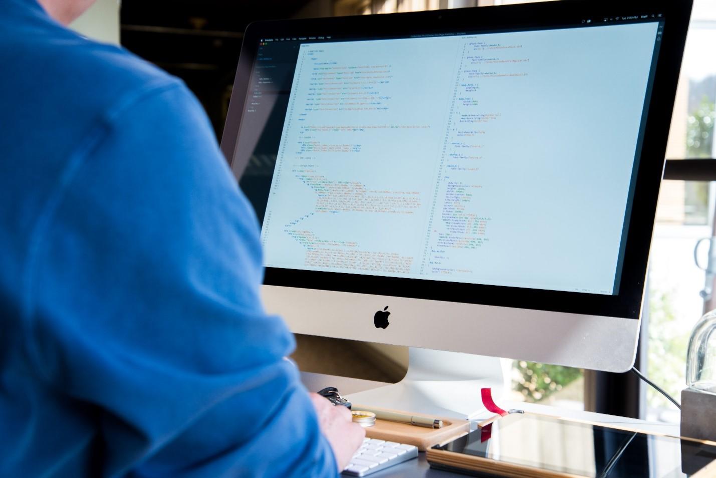 A programming student attending a computer class