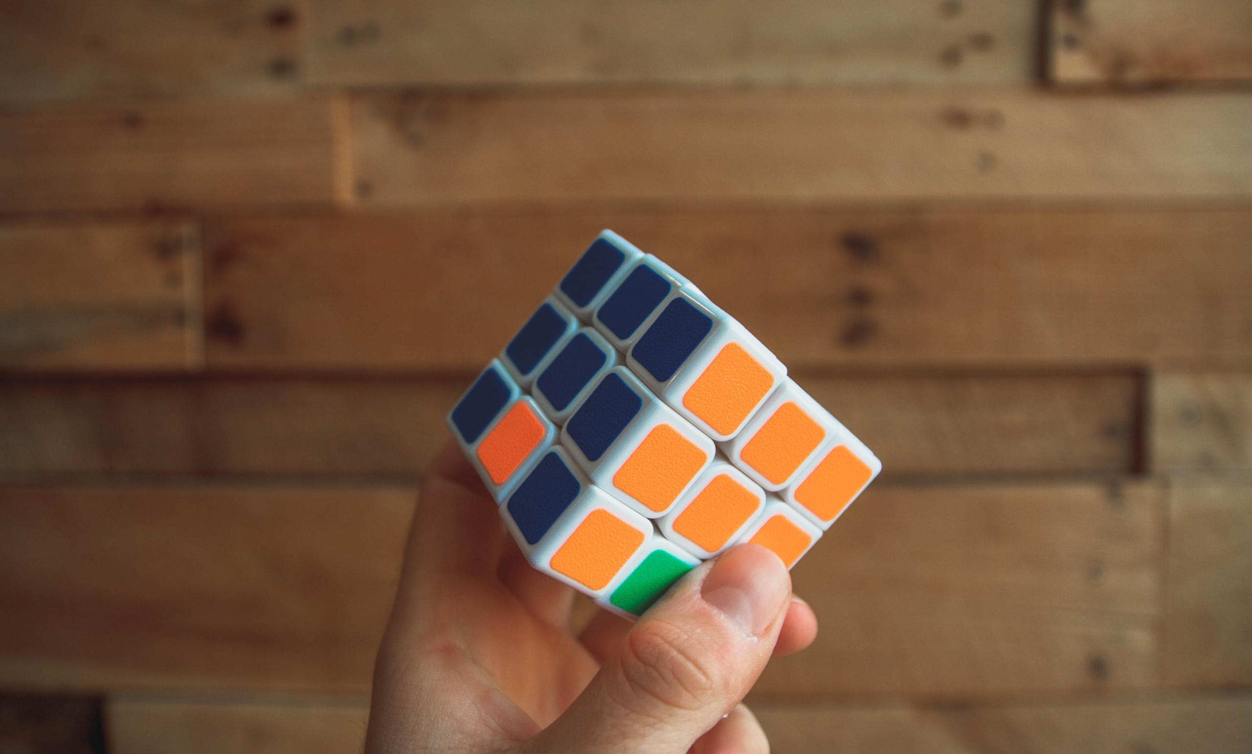 Learning tricks to solve a Rubik cube