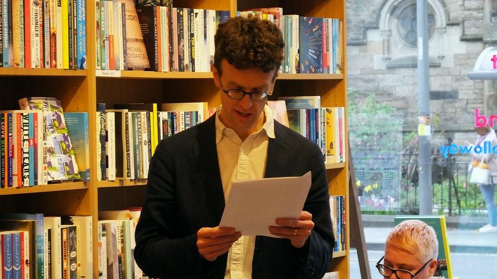 A man reading a document in German