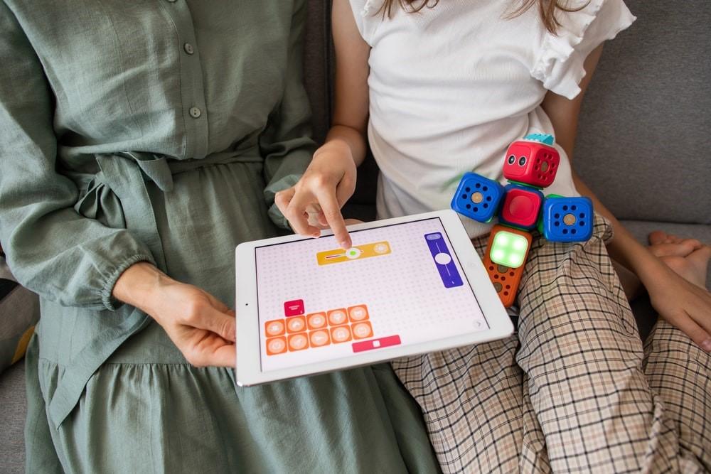 A small child learning visual programming