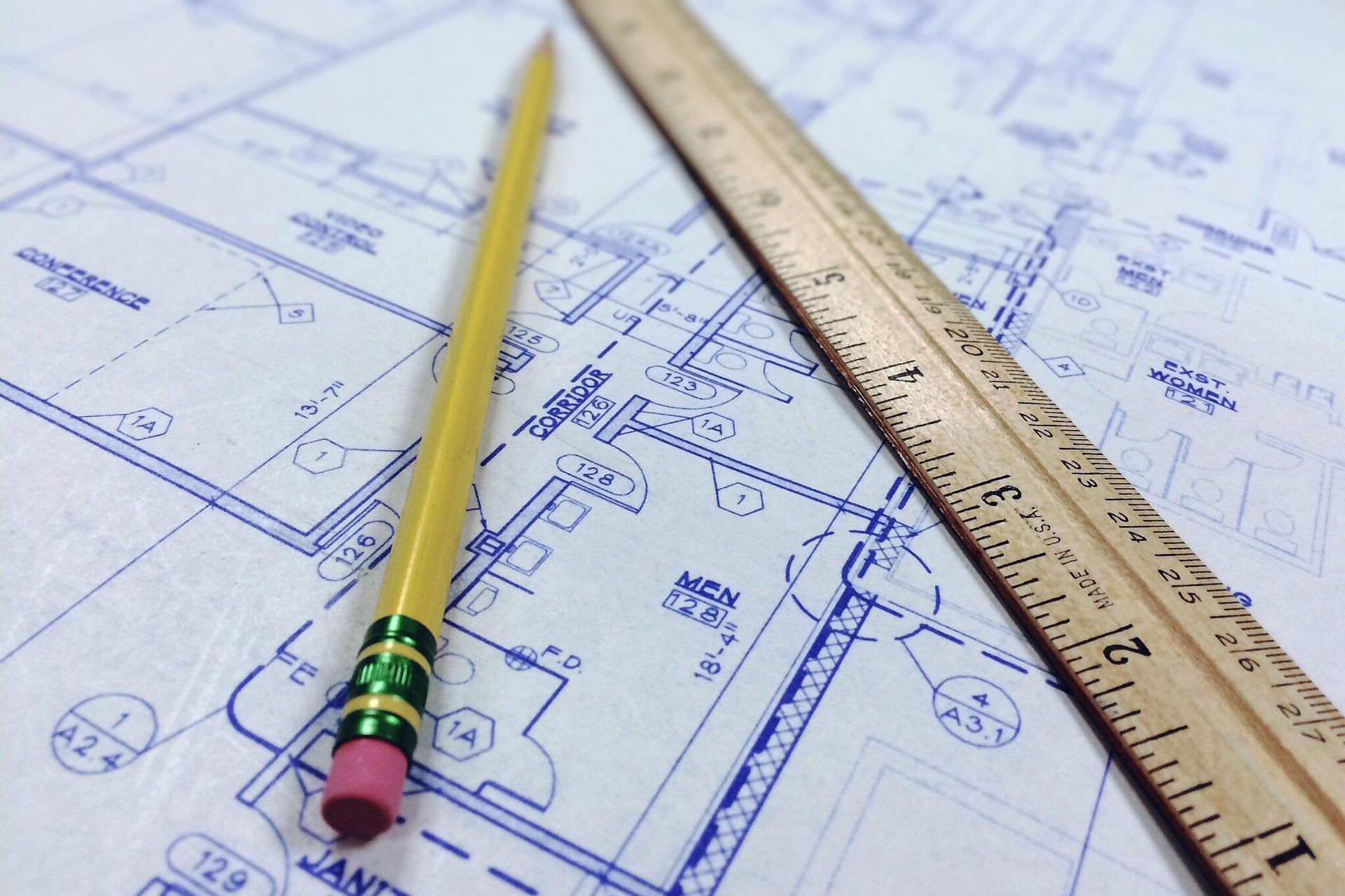 Pencil and ruler on a blueprint