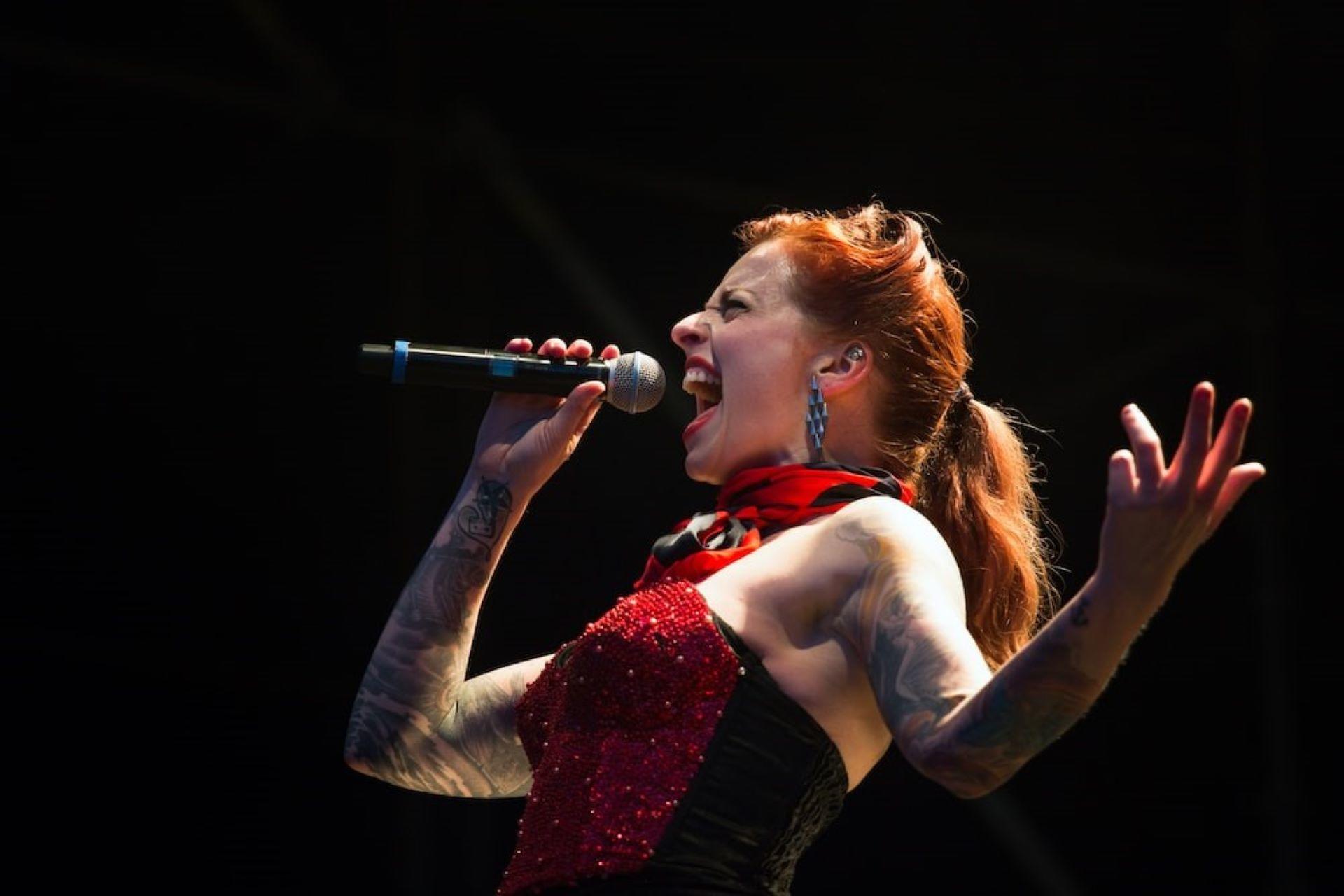 A pop singer performing on stage