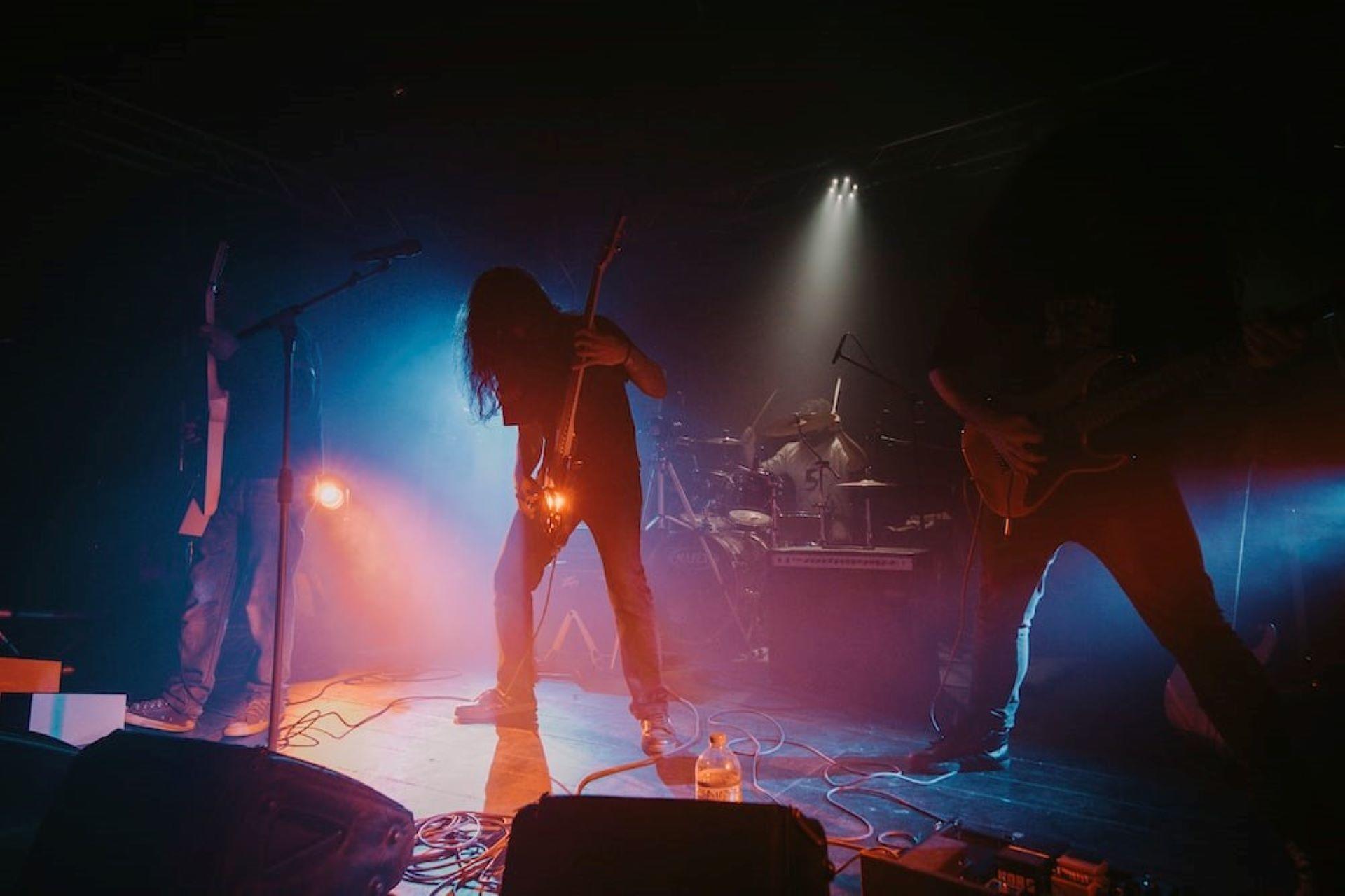 A pop band performing on stage