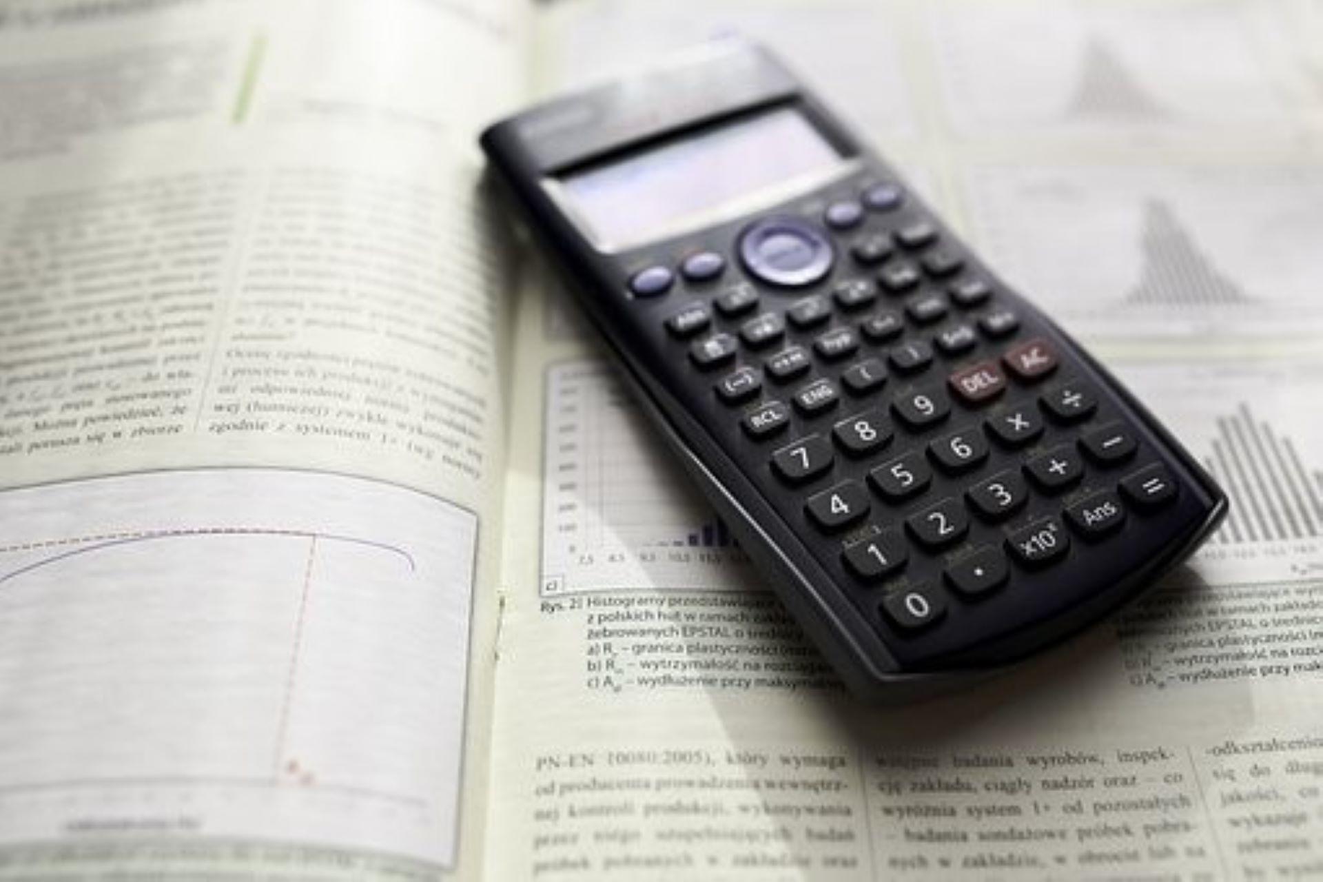 Scientific calculator on a book