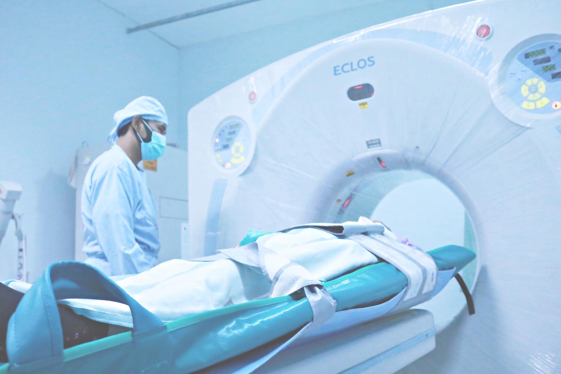 A medical physicist performing MRI on a patient