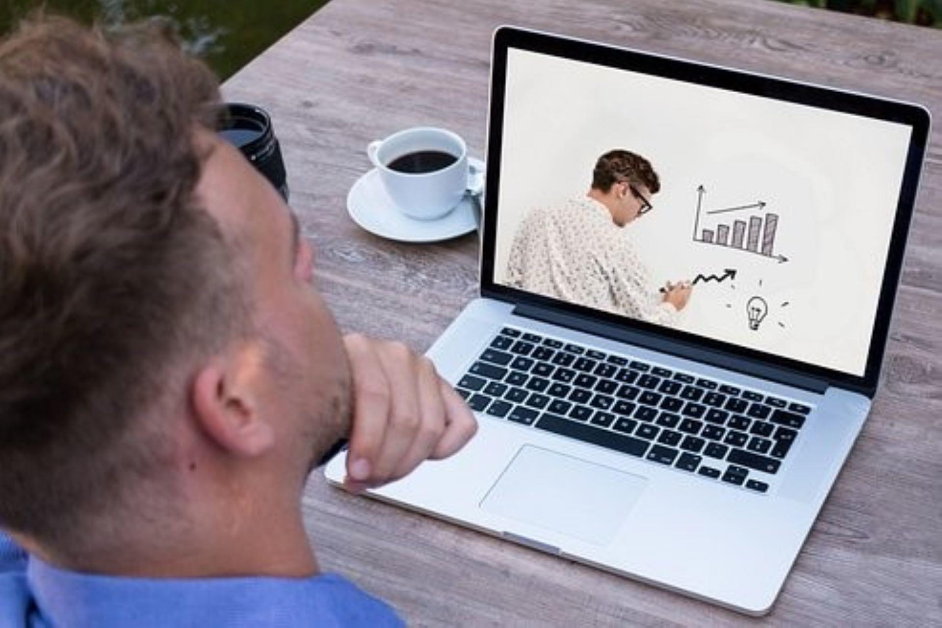 An online tutor giving a webinar on physics