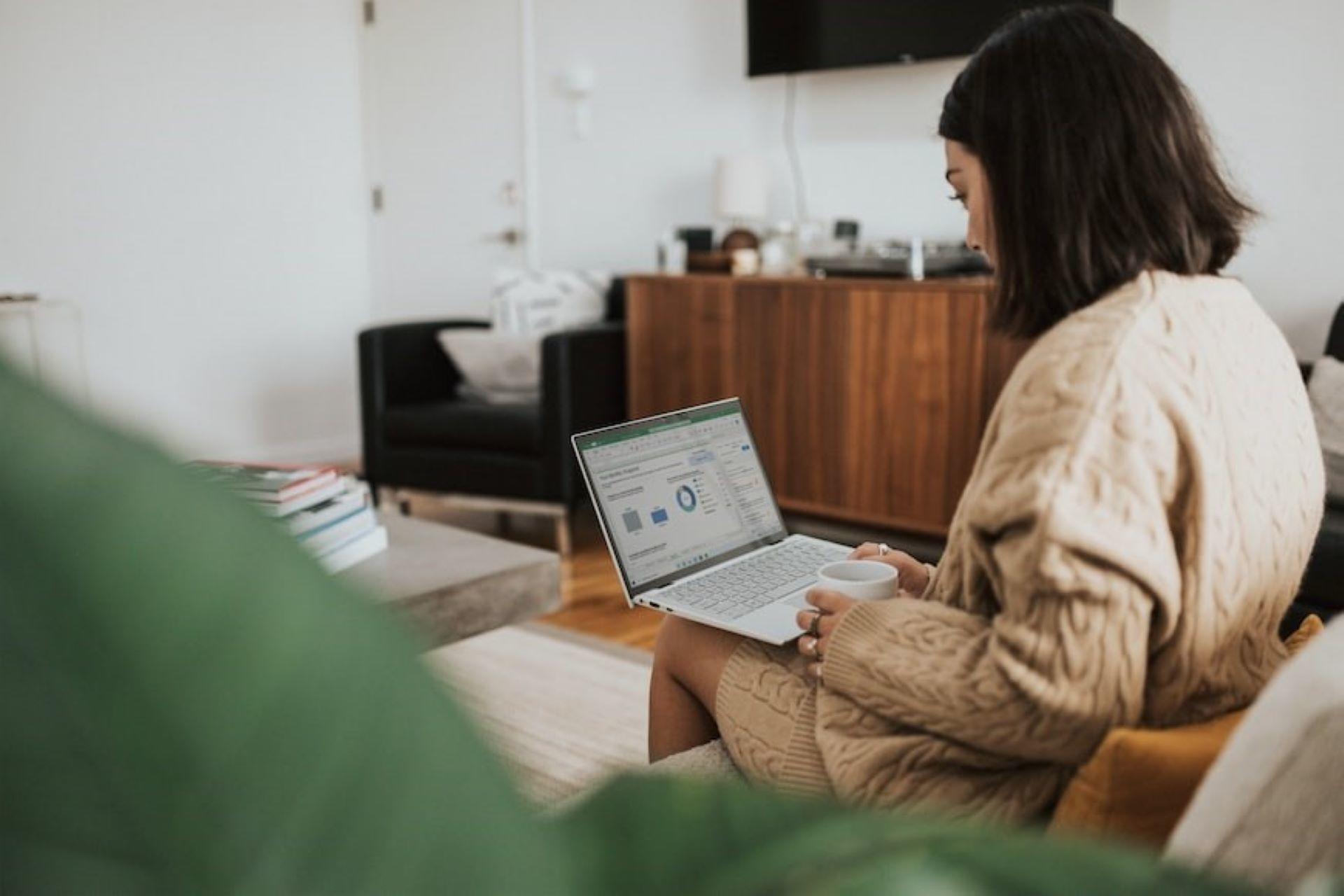 A woman learning data science on a laptop