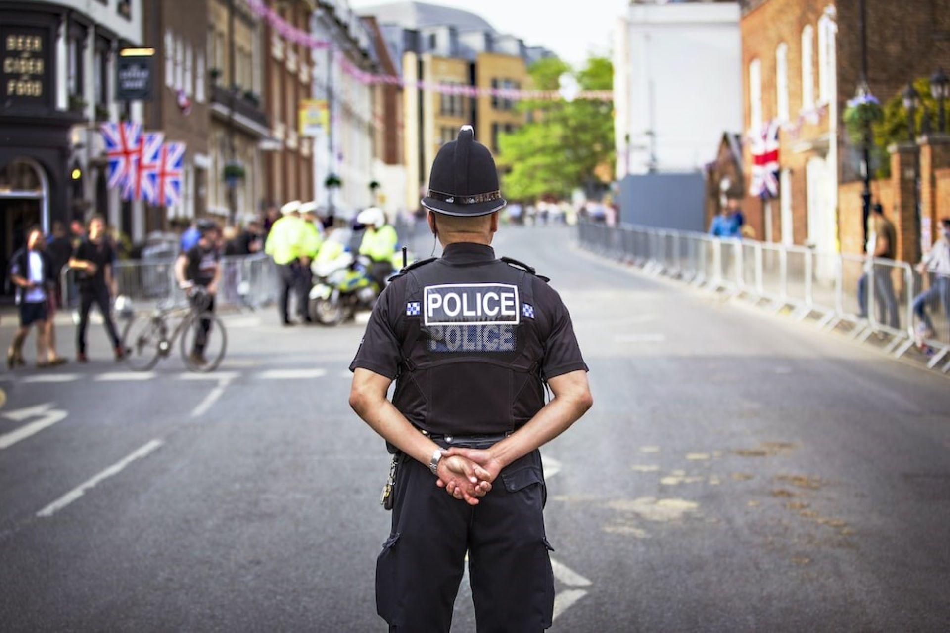 A criminal law police officer standing in the street