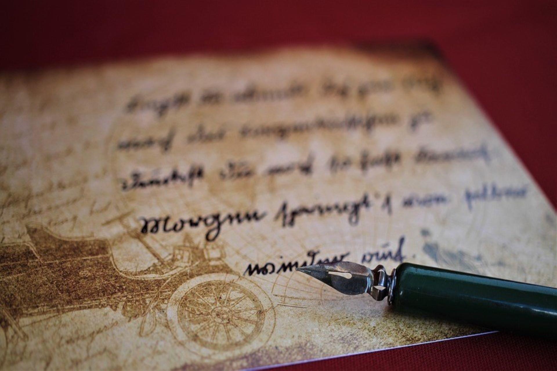 Text written on paper along with a pen