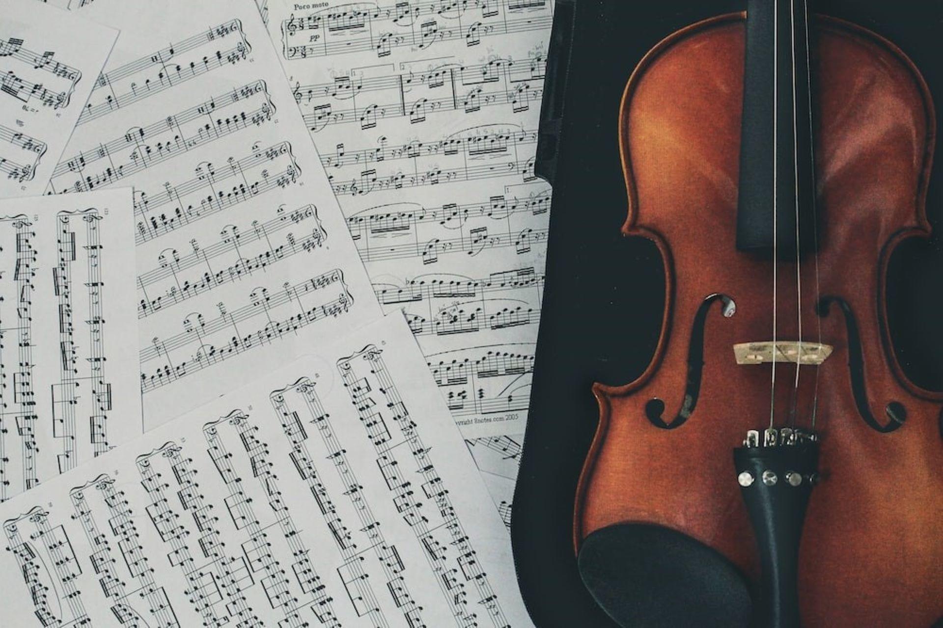 A violin with sheet music.
