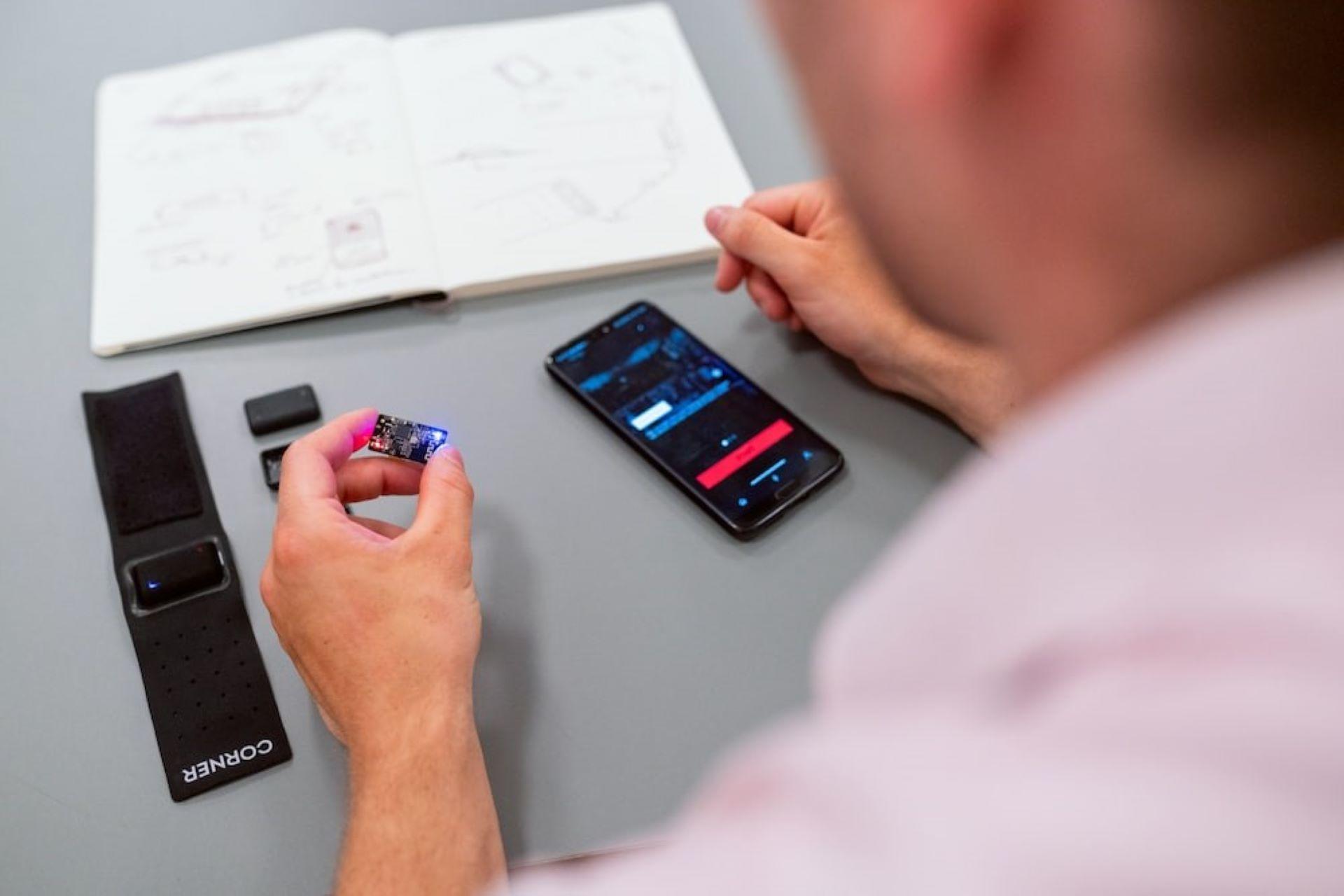 A engineer using a performance-tracking device for boxing