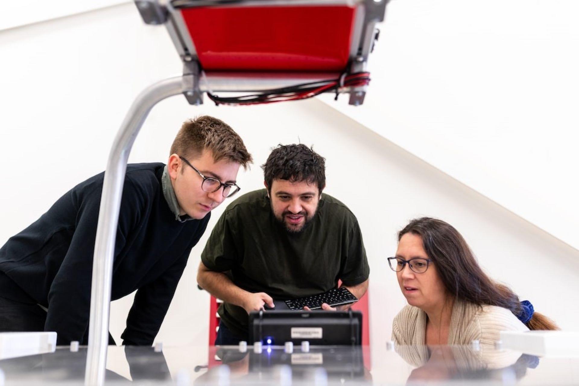Mechanical engineers working on sustainable agricultural robotics