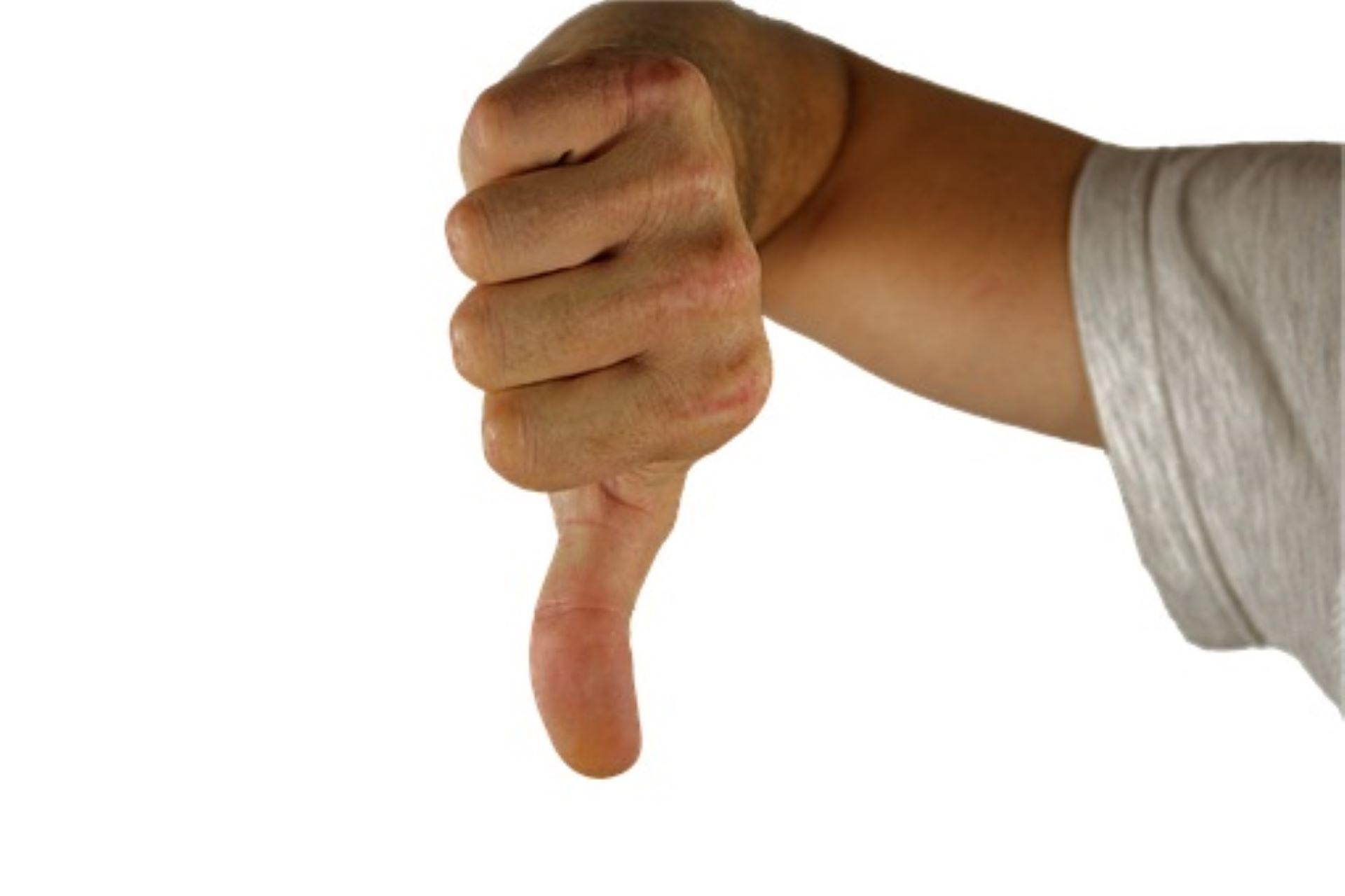 A man showing a thumbs-down sign.