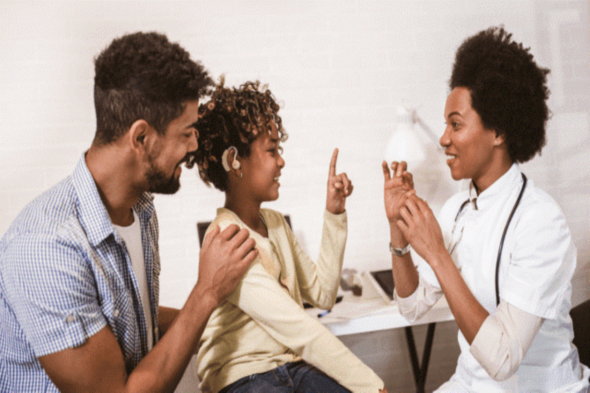 A pathologist teaching sign language. 