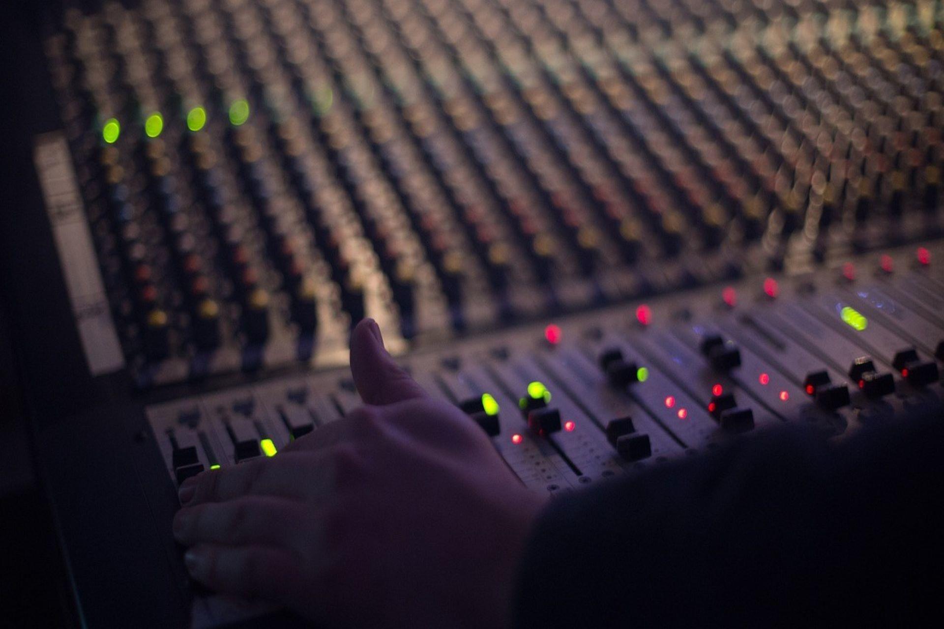 A music producer composing music.