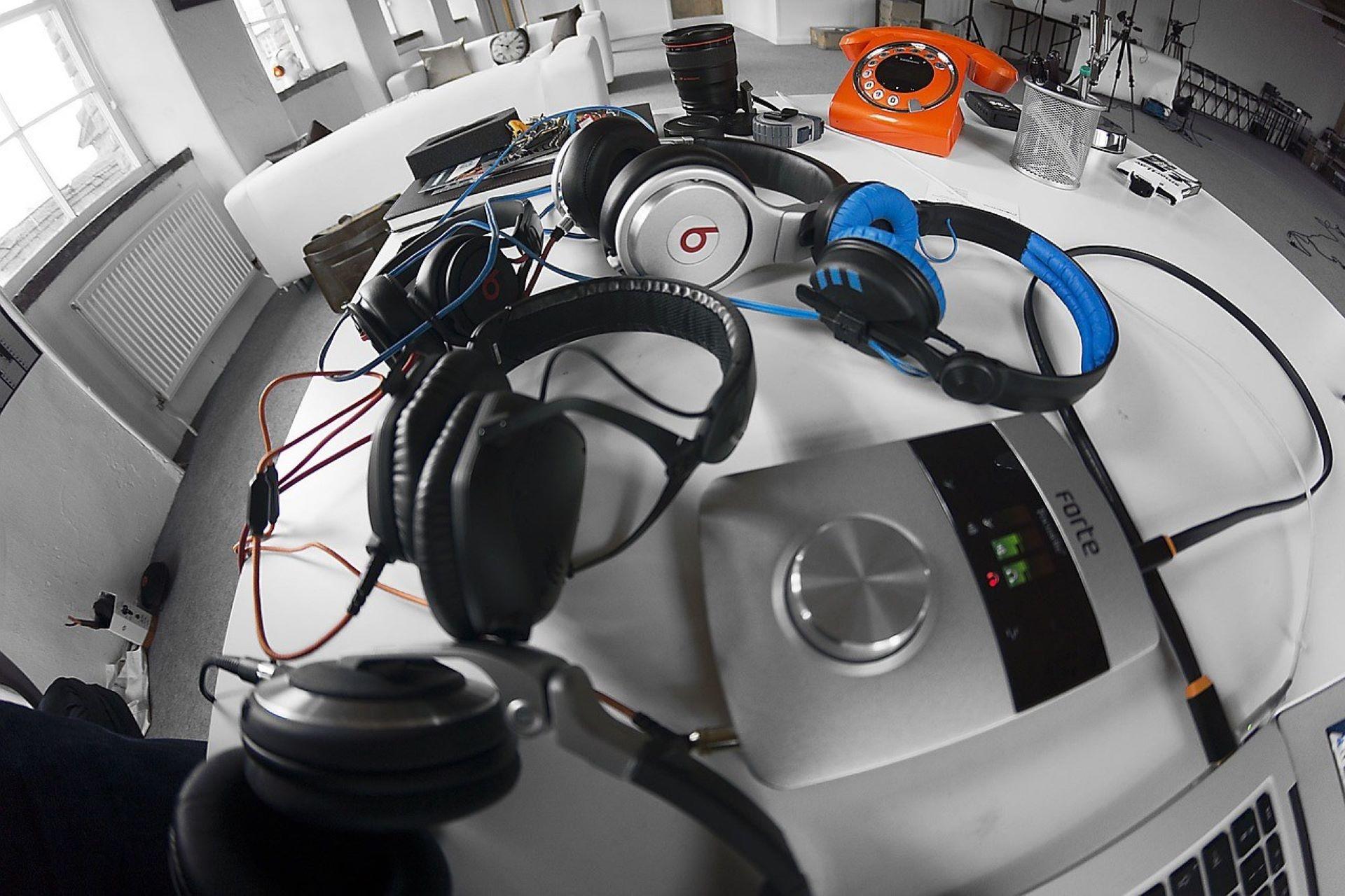 Different headsets are placed in a studio.