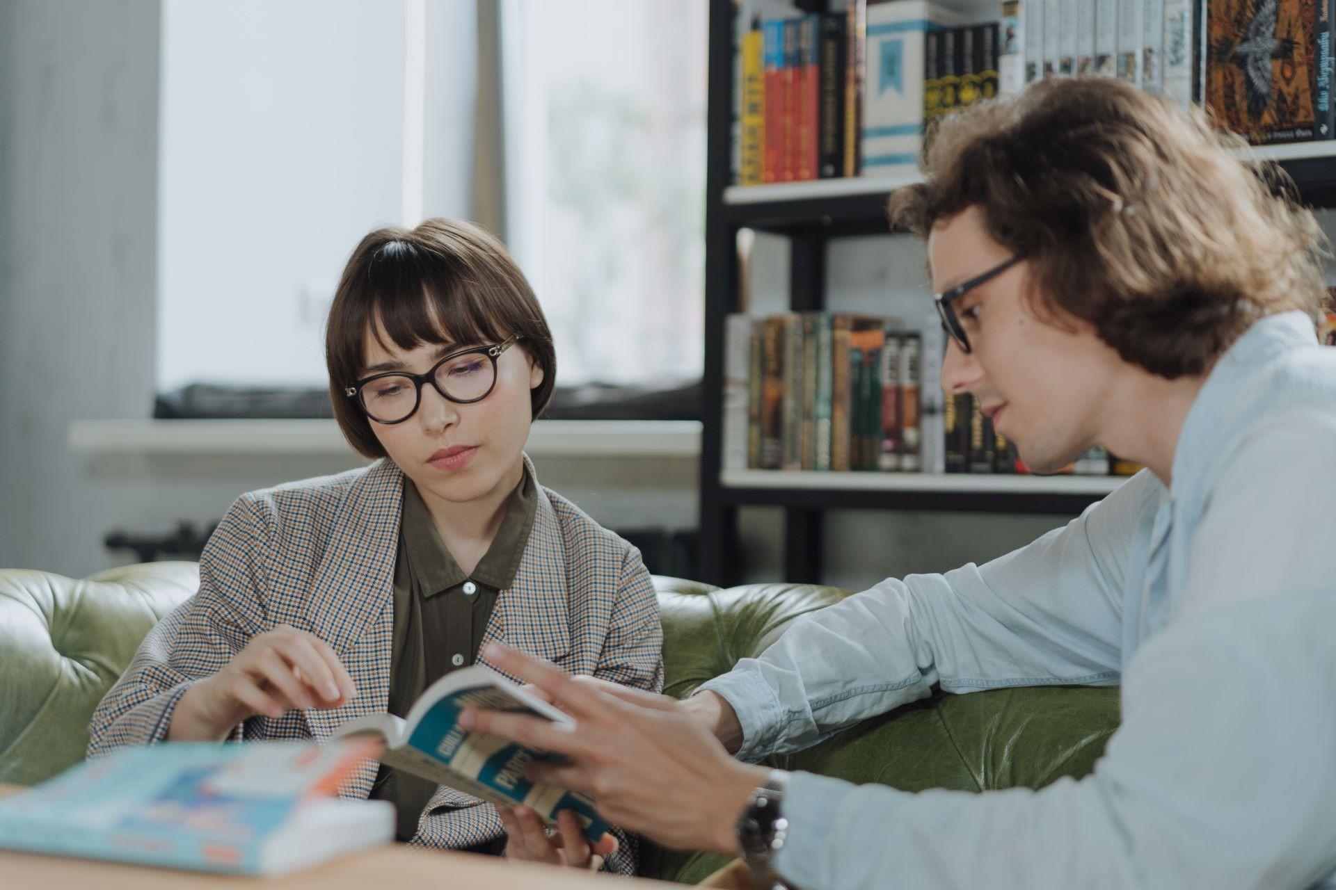Two students studying in a group study session.