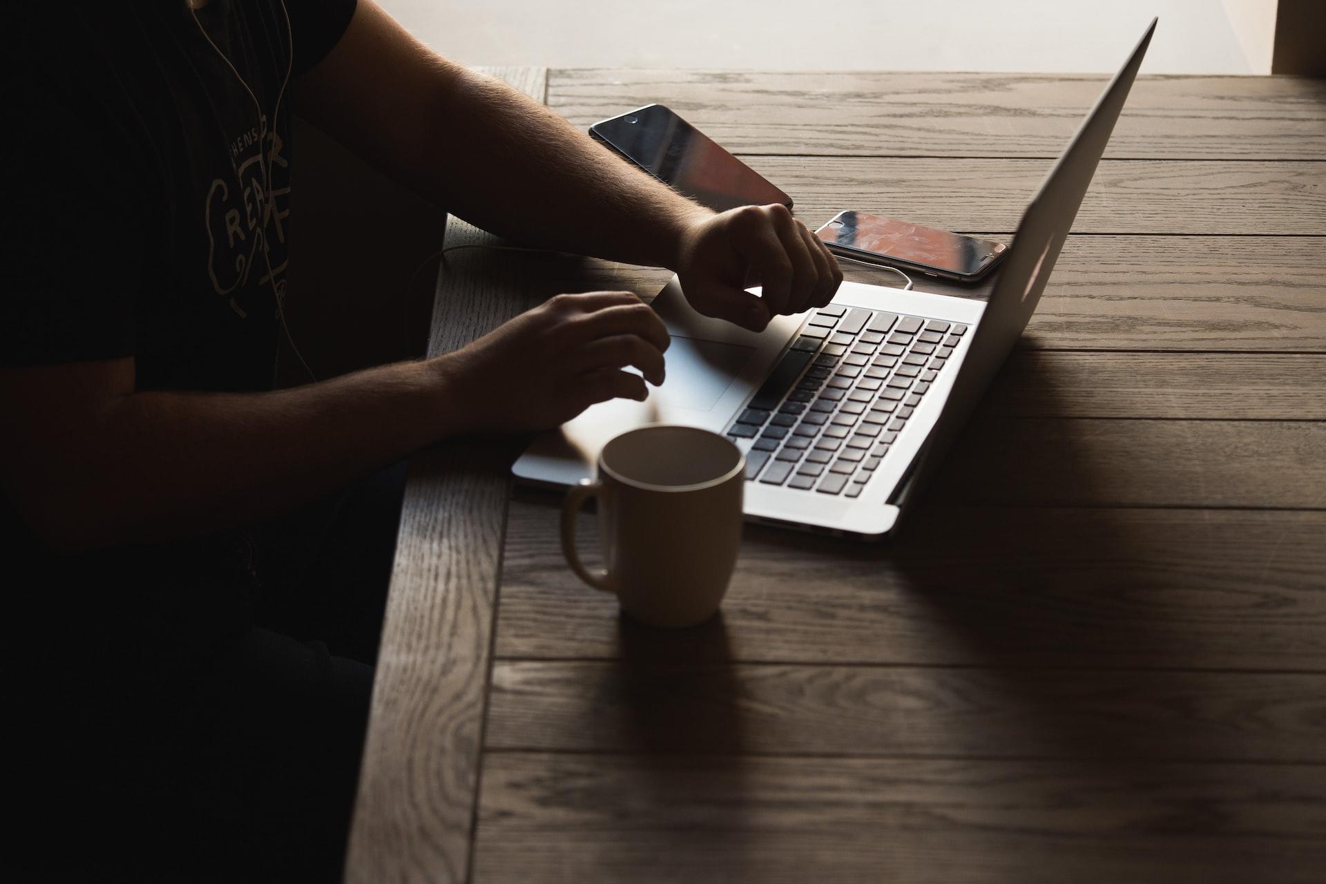 A person at a laptop computer