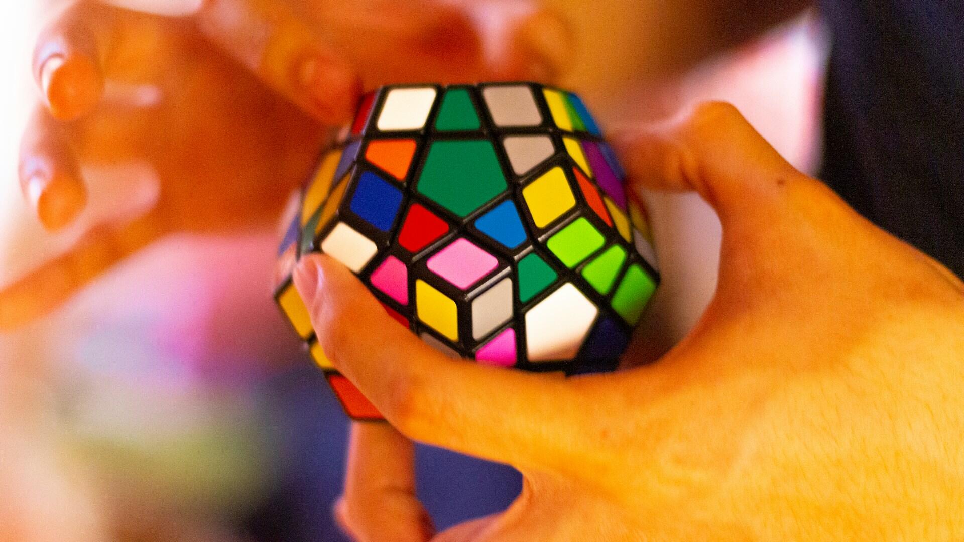 a rubik's cube with more than 6 sides, it is a polyhedron rather than a cube