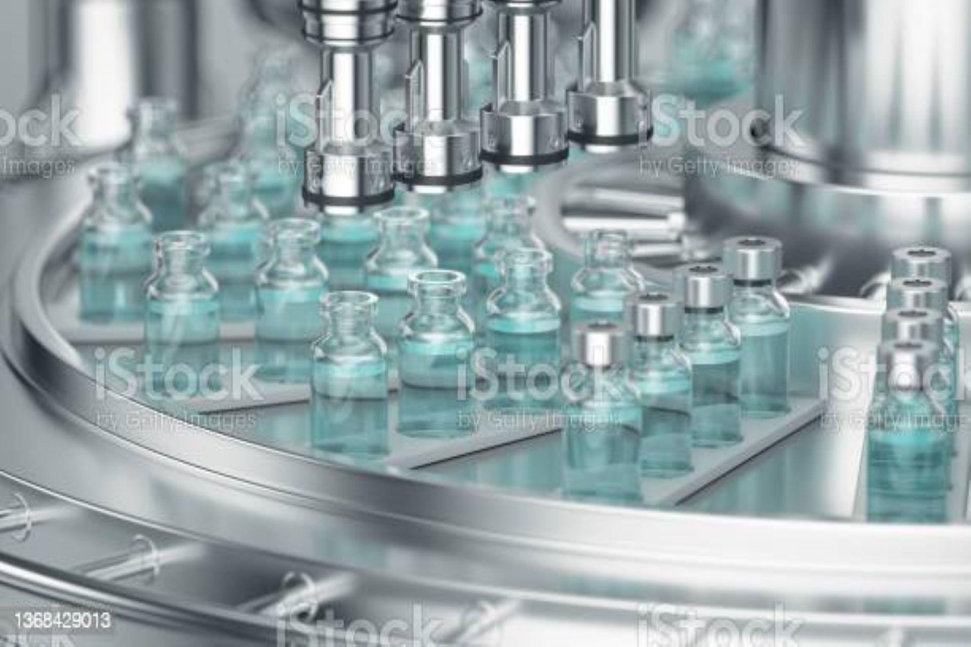 Glass bottles on an automatic conveyor line.