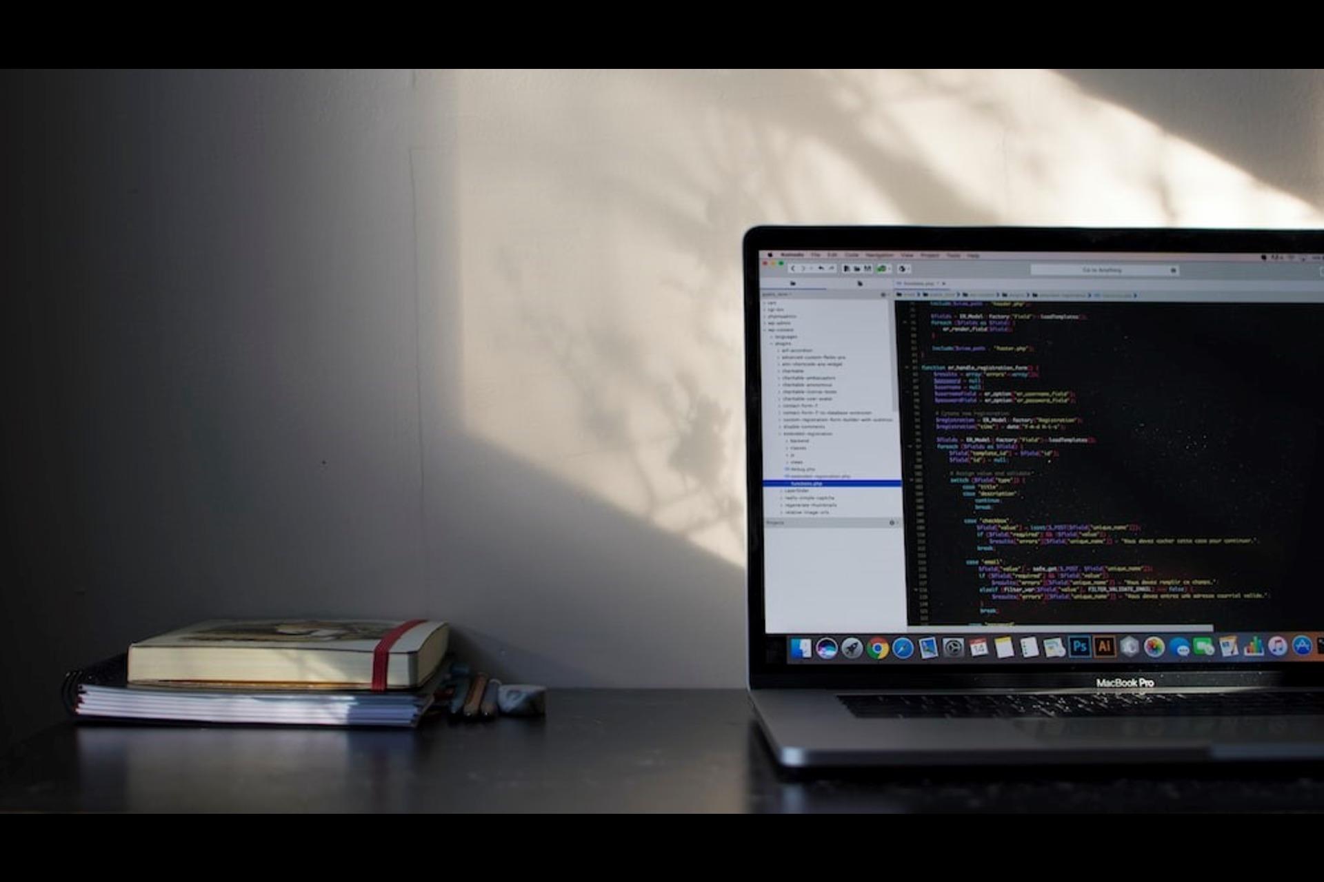 A MacBook Pro with the programming language being displayed.